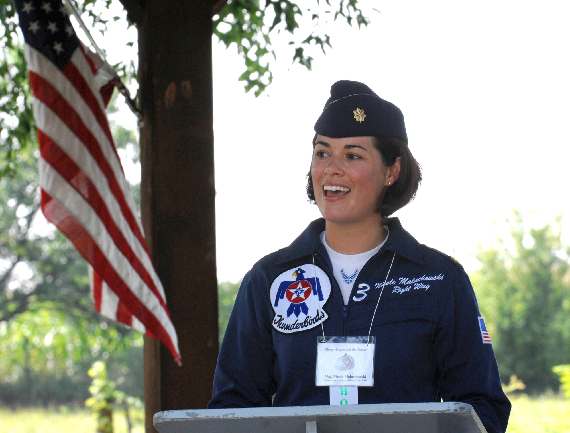 Maj. Nicole Malachowski speaks at a ceremony honoring her induction into the International Forest of Friends Aug. 4 at Atchison, Kan. She is first female pilot with the Thunderbirds. (U.S. Air Force photo/Airman 1st Class Cory G. Todd) 
