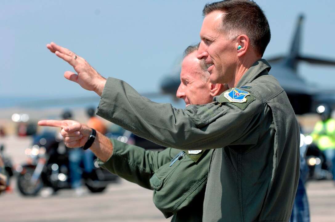 Col. Scott Vander Hamm, 28th Bomb Wing commander and Lt. Gen. Norman Seip, 12th Air Force and Air Forces Southern commander bid farewell to the nearly 200 motorcycle riders from the Ellsworth Dakota Thunder Motorcycle Club and across the globe prepare to embark on a ride from Ellsworth Air Force Base, S.D., to the 66th annual Sturgis Motorcycle Rally, Aug. 7, 2007.  (U.S. Air Force photo/Staff Sgt. Michael B. Keller)
