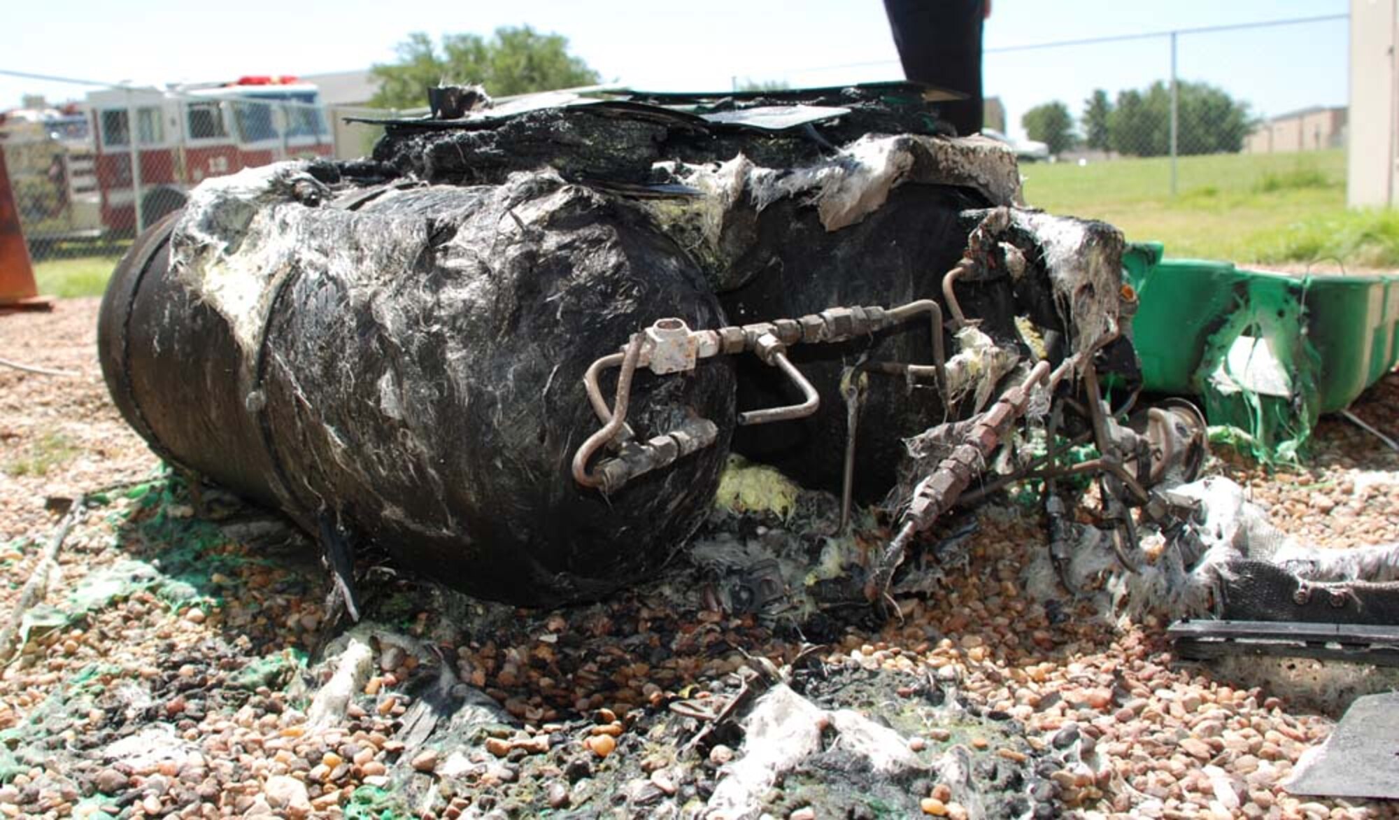 A flash fire caused this Will Rogers Air National Guard Base Mobile Oxygen Storage Tank to burn while Team Sheppard members were filling it prior to a leak test Aug. 8 at Bldg. 1924. No serious injuries occured as a result of the incident. Sheppard fire officials said the incident is still under investigation. (U.S. Air Force photo/Airman 1st Class Jacob Corbin)