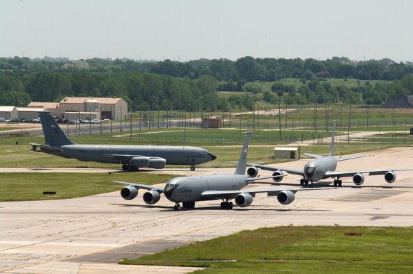 MCCONNELL AIR FORCE BASE, Kan. -- McConnell KC-135 Stratotankers turn on to a taxiway to form an "elephant walk" formation here Aug. 5 during a generation exercise. The exercise showcased McConnell aircrews’ capability to prepare a flight and take off within minutes of being notified of a mission. These types of exercises are conducted randomly each year. (Photo by Tech. Sgt. Chyrece Campbell)