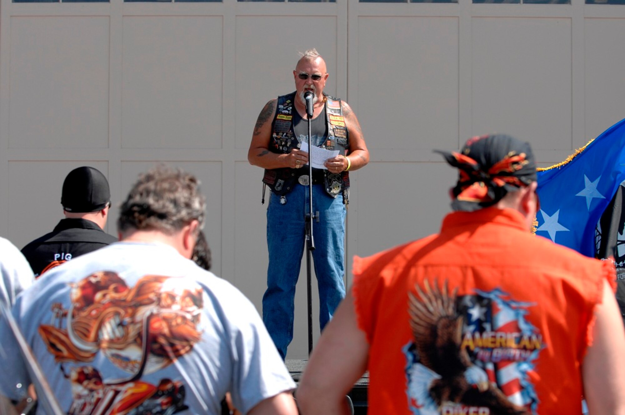 Auggie Minzlaff, an area representative for the Christian Motorcyclists Association, says a blessing for the nearly 200 motorcycle riders from the Ellsworth Dakota Thunder Motorcycle Club and across the globe preparing to embark on a ride from Ellsworth Air Force Base, S.D., to the 66th annual Sturgis Motorcycle Rally, Aug. 7, 2007.  (U.S. Air Force photo/Staff Sgt. Michael B. Keller)
