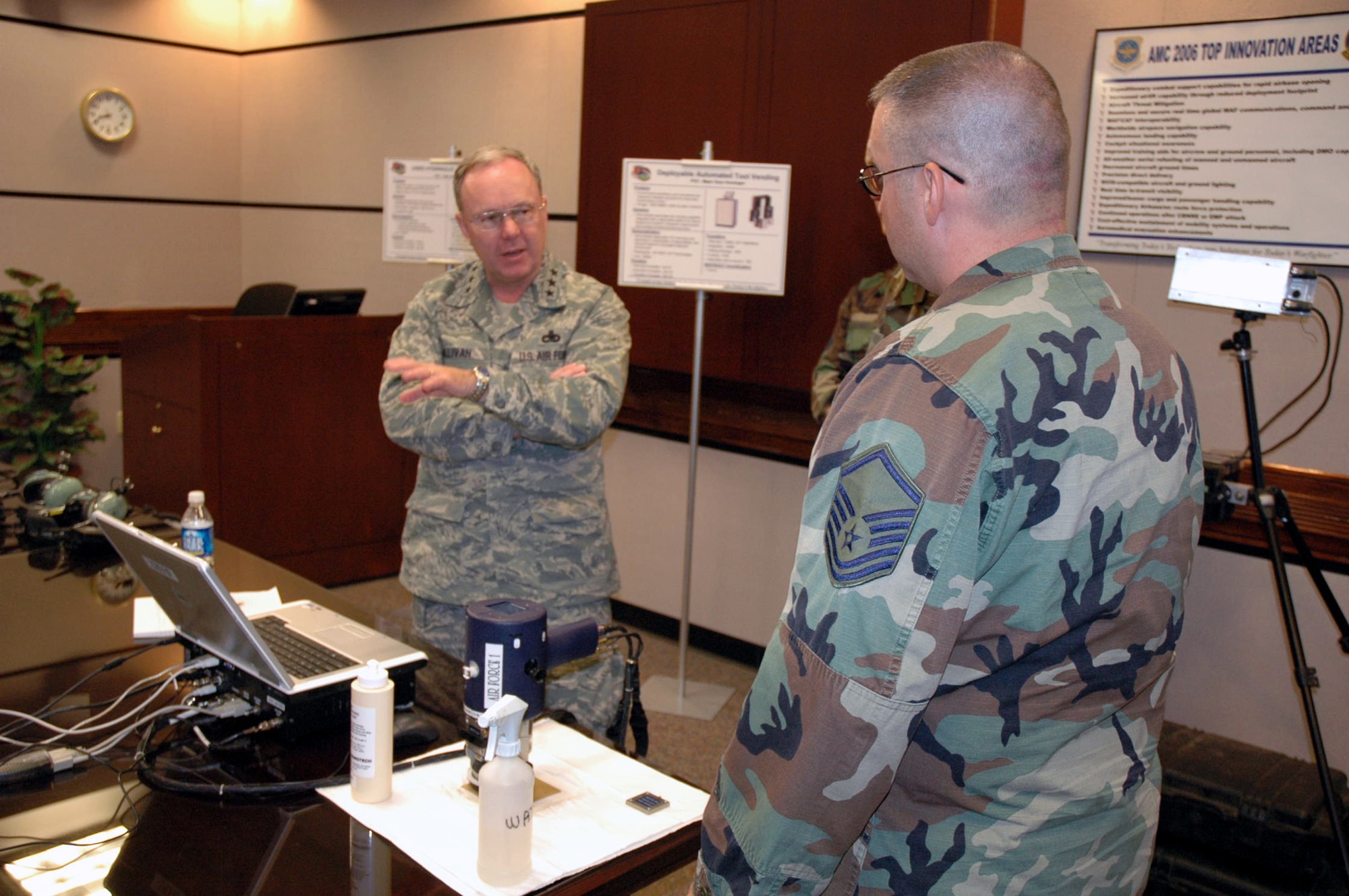 Lt. Gen. Kevin J. Sullivan, Deputy Chief of Staff for Logistics, Installations and Mission Support, Headquarters U.S. Air Force, Washington, D.C., talks with Airmen in the Air Mobility Battlelab about initiatives the battlelab has completed during a visit to the U.S. Air Force Expeditionary Center Aug. 3, 2007, at Fort Dix, N.J.  General Sullivan is responsible to the Chief of Staff for leadership, management and integration of Air Force logistics readiness, aircraft and missile maintenance, civil engineering and security forces, as well as setting policy and preparing budget estimates that reflect enhancements to productivity, combat readiness and quality of life for Air Force people.  (U.S. Air Force Photo/Tech. Sgt. Scott T. Sturkol)
