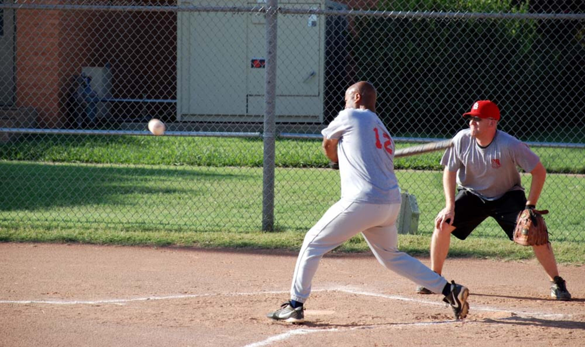 Joseph Rogers, 89th/90th Flying Training Squadron Banshees, gets ready to slam the ball down range during the 2007 Intramural Softball Championships Aug. 7. The Banshees Banshees defeated the 382nd Training Squadron/882nd Training Support Squadron to take the championship. (U.S. Air Force photo/Airman 1st Class Jacob Corbin)