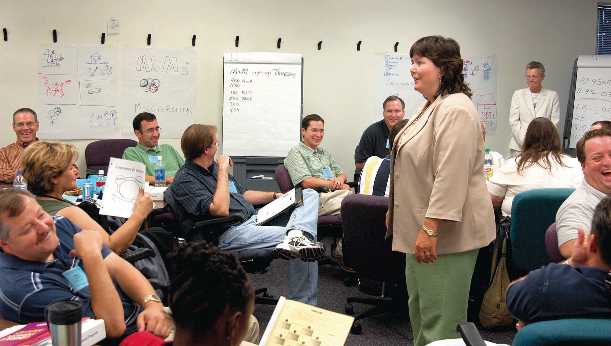 Leadership trainer Kathy Hanson challenges Tinker personnel with leadership questions and examples, sometimes getting revealing, humorous answers, during the Aug. 1 program at the Tom Steed Center on the Rose State College campus. (Air Force photo by Margo Wright)