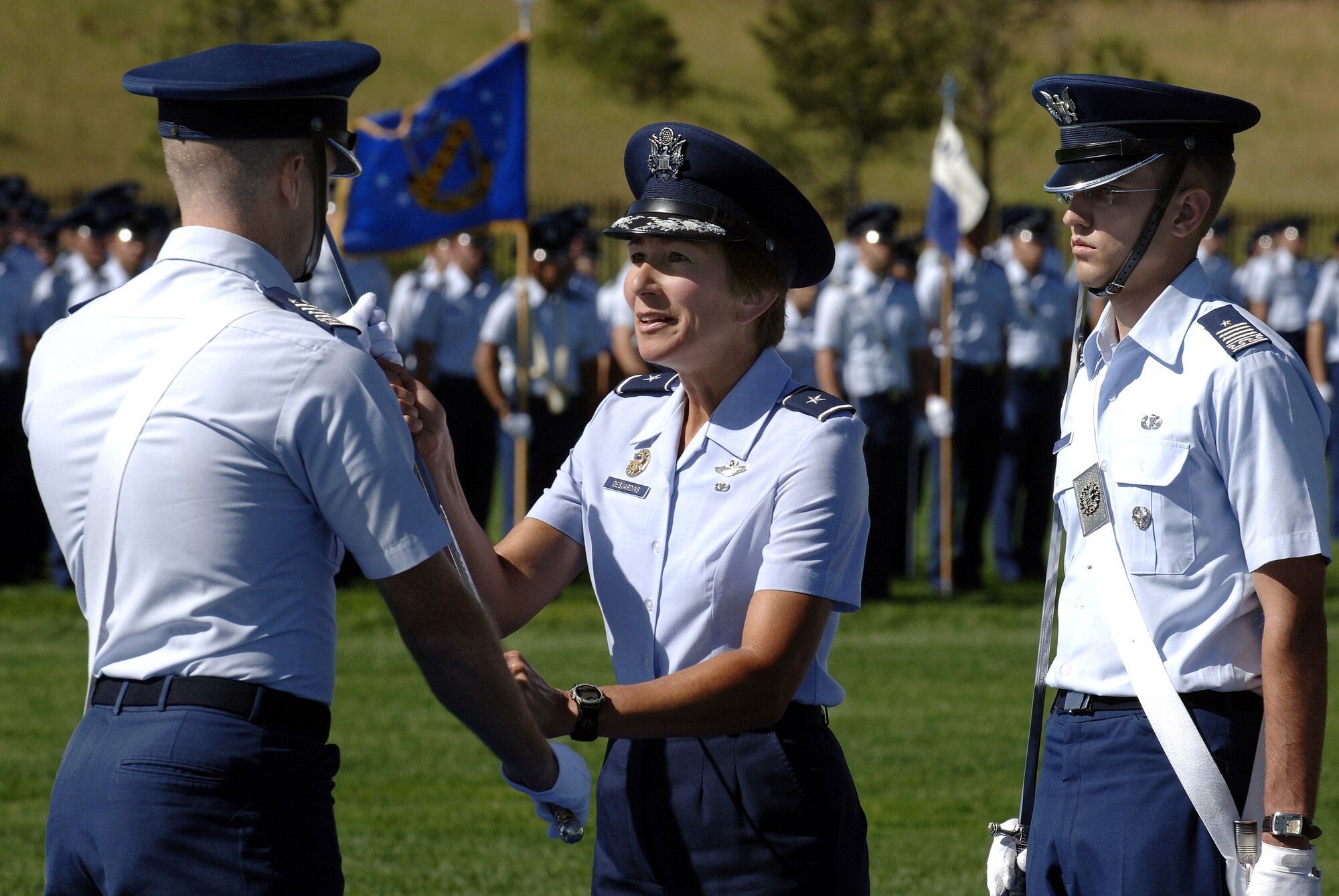 Brig. Gen Susan Y. Desjardins, commandant of cadets, officiates the cadet change of command ceremony Aug. 8 on the Stillman Parade field at the U. S. Air Force Academy in Colorado Springs, Colo., during the Acceptance Parade.  The Acceptance Parade marks the formal acceptance of the new cadets into the cadet wing.  (U.S. Air Force photo/Mike Kaplan)