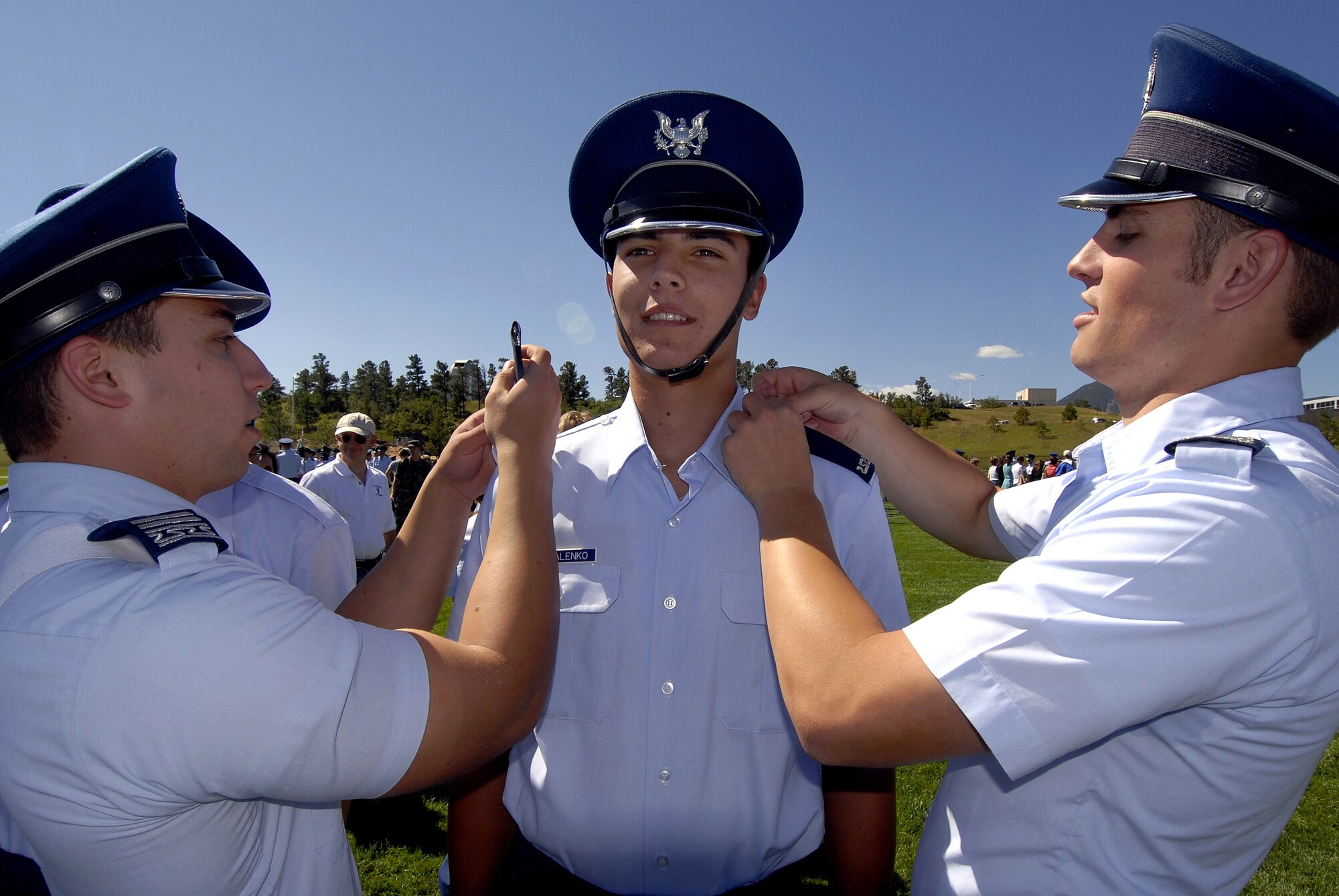 U.S. Air Force Academy Cadet 4th Class Vladimir Kovalenko receives his shoulder boards at the conclusion of the Acceptance Parade Aug. 8 at the Academy in Colorado Springs, Colo.  The Acceptance Parade marks the formal acceptance of the new cadets into the cadet wing.  (U.S. Air Force photo/Mike Kaplan)