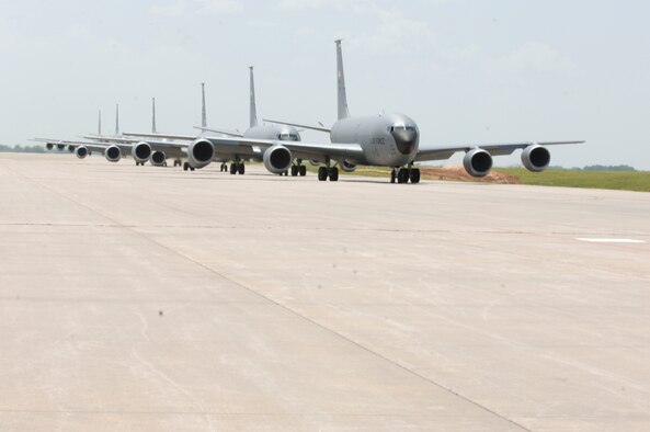 MCCONNELL AIR FORCE BASE, Kan. -- Six McConnell KC-135 Stratotankers demonstrate the "elephant walk" formation as they taxi down a runway here Aug. 5 during a generation exercise. The exercise showcased McConnell aircrews’ capability to prepare a flight and take off within minutes of being notified of a mission. These types of exercises are conducted randomly each year. (Photo by Airman Justin Shelton)