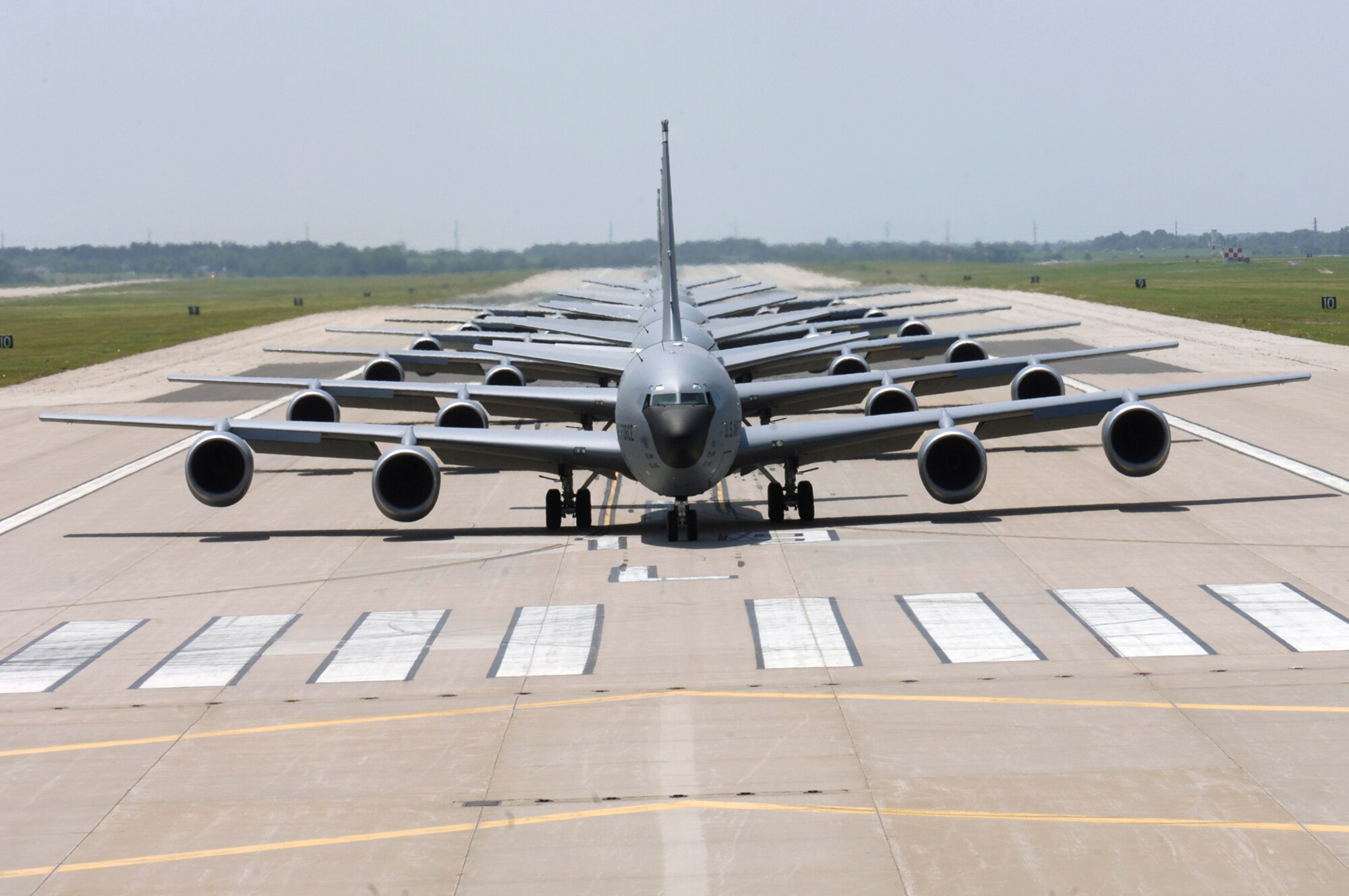 MCCONNELL AIR FORCE BASE, Kan. -- Six McConnell KC-135 Stratotankers demonstrate the "elephant walk" formation as they taxi down a runway here during a generation exercise. The exercise showcased McConnell aircrews’ capability to prepare a flight and take off within minutes of being notified of a mission. These types of exercises are conducted randomly each year. (Photo by Airman 1st Class Laura Suttles)