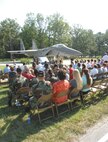 Brig. Gen. C. D. Moore II, commander of the 478th Aeronautical Systems Wing at Wright-Patterson AFB, pays tribute to Major Jim Duricy at AEDC’s F-15 Eagle dedication ceremony.