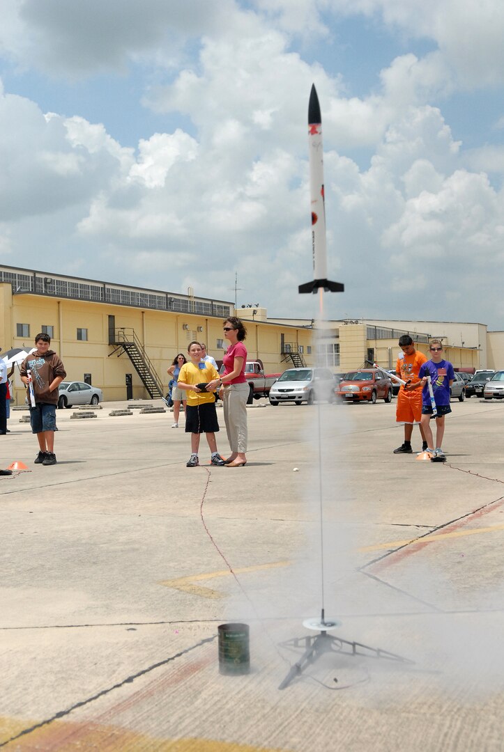 A rocket launches successfully Aug. 3 as the final summer Starbase Kelly academy ends at the 433rd Airlift Wing at Lackland Air Force Base, Texas. Three summer camps were held this year for Team Lackland 10- and 11-year olds.  The academy includes aircraft tours, scientific experiments, rocket building and launching, computer flight simulation and teamwork and goal-setting exercises. (USAF photo by Alan Boedeker)