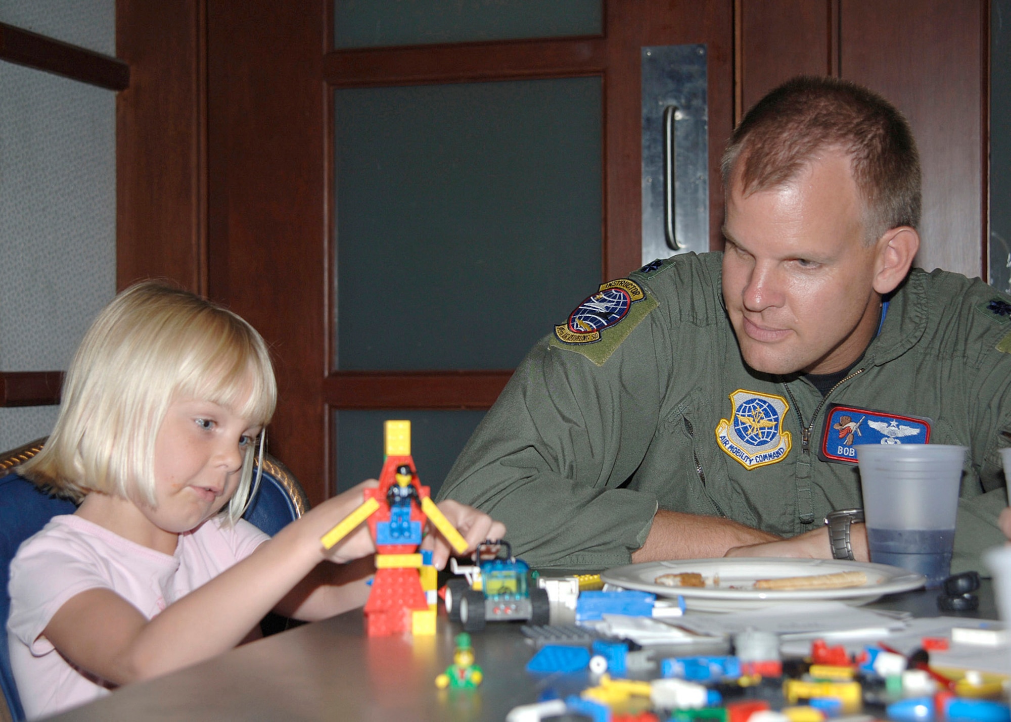 MCONNELL AIR FORCE BASE, Kan. -- Rhys Pritchett, 10, Team McConnell family member, plays with building blocks during the Lego workshop at Robert J. Dole Community Center, Aug. 2. The workshop helps members share ideas for the upcoming Create a Masterpiece Contest.  (Photo by Amn Justin Shelton)