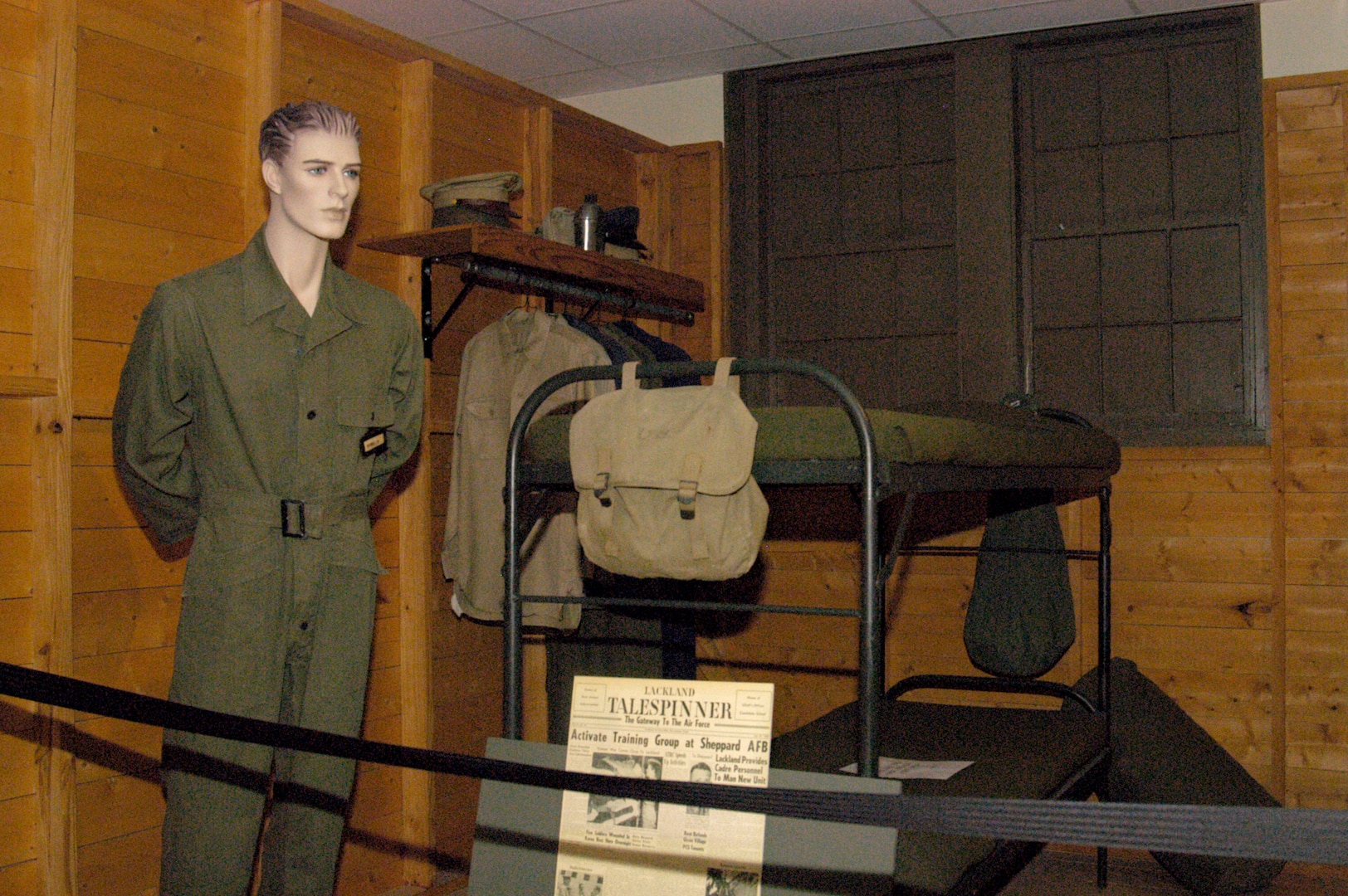 This display at the History and Traditions Museum portrays the living quarters of Airmen in training during the early 1950s. The uniform, books and footlocker are all in proper order. The museum, located at the intersection of George Avenue and Nellis Street, is open Monday through Friday from 9 a.m. to 4 p.m. (USAF photo by Mandi Cruz)                          