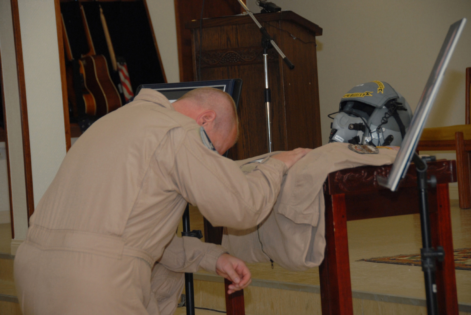 SOUTHWEST ASIA - An Airman with the 379th Air Expeditionary Wing grieves for the loss of Tech. Sgt. Joey Link, 746th Expeditionary Airlift Squadron. Sergeant Link died of natural causes Aug. 5 at Landstuhl Regional Medical Facility, Germany. (U.S. Air Force photo by Airman 1st Class Ashley Tyler)