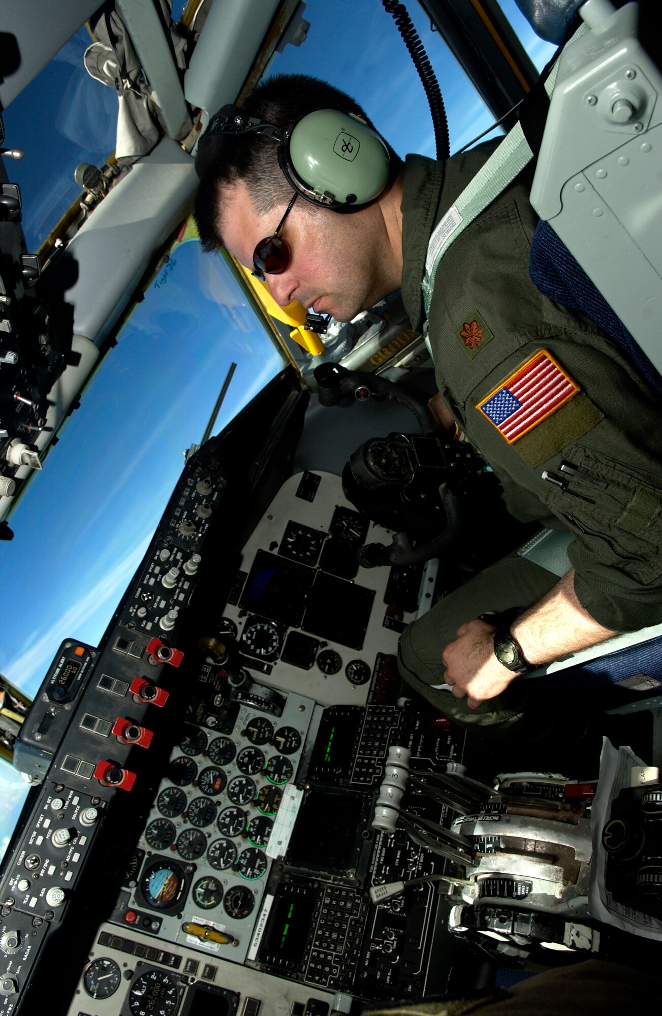 ANDERSEN AFB, GUAM - Maj. Dave Jarmon, an instructor pilot with the 905th Air Refueling Squadron, New Hampshire Air National Guard, flies a KC-135 Stratotanker, during Valiant Shield, Aug. 9, 2007.  During the exercise, U.S. Air Force aircraft and personnel from stateside bases and Kadena Air Base, Japan, work together as part of an expeditionary air wing based at Andersen AFB, Guam. Andersen AFB will also be the beddown location for approximately 64 U.S. Air Force and 29 U.S. Navy aircraft, plus transient aircraft, during Valiant Shield. Valiant Shield 07, the largest joint exercise in recent history, includes 30 ships, more than 280 aircraft and more than 20,000 service members from the Navy, Marine Corps, Air Force and Coast Guard. (U.S. Air Force photo by Senior Airman Miranda Moorer) 