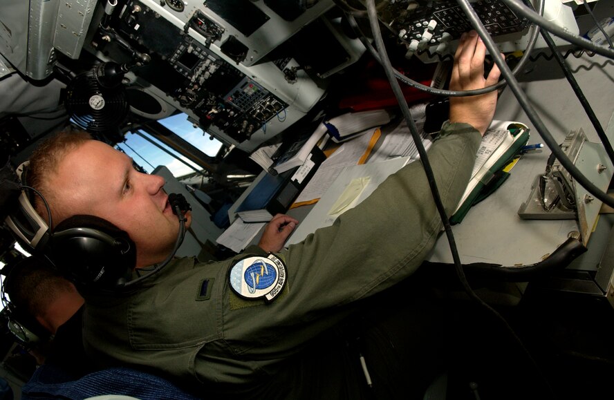 ANDERSEN AFB, GUAM - 1st Lt. Christopher Johnson, from the 905th Air Refueling Squadron, Grand Forks, N.D., assists the pilots of a KC-135 Stratotanker during Valiant Shield, Aug. During the exercise, U.S. Air Force aircraft and personnel from stateside bases and Kadena Air Base, Japan, work together as part of an expeditionary air wing based at Andersen AFB, Guam. Andersen AFB will also be the beddown location for approximately 64 U.S. Air Force and 29 U.S. Navy aircraft, plus transient aircraft, during Valiant Shield. Valiant Shield 07, the largest joint exercise in recent history, includes 30 ships, more than 280 aircraft and more than 20,000 service members from the Navy, Marine Corps, Air Force and Coast Guard. (U.S. Air Force photo by Senior Airman Miranda Moorer) 