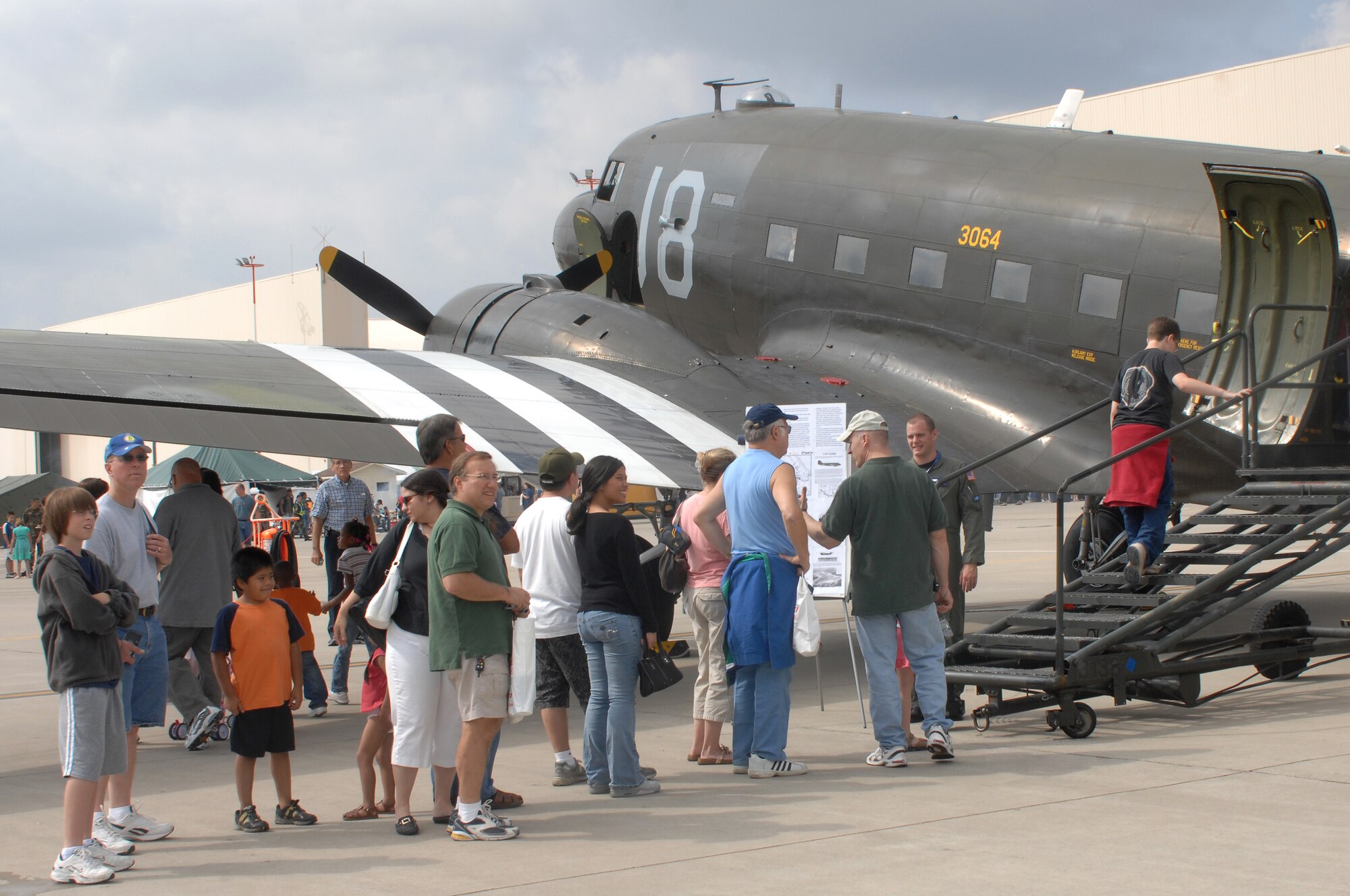 A crowd views the C-47 Dakota whose arrival officially kicked off U.S. Air Forces in Europe's Air Force 60th Anniversary celebration, August 11, 2007, Ramstein Air Base, Germany. (U.S. Air Force photo/Airman 1st Class Kenny Holston)(RELEASED)     