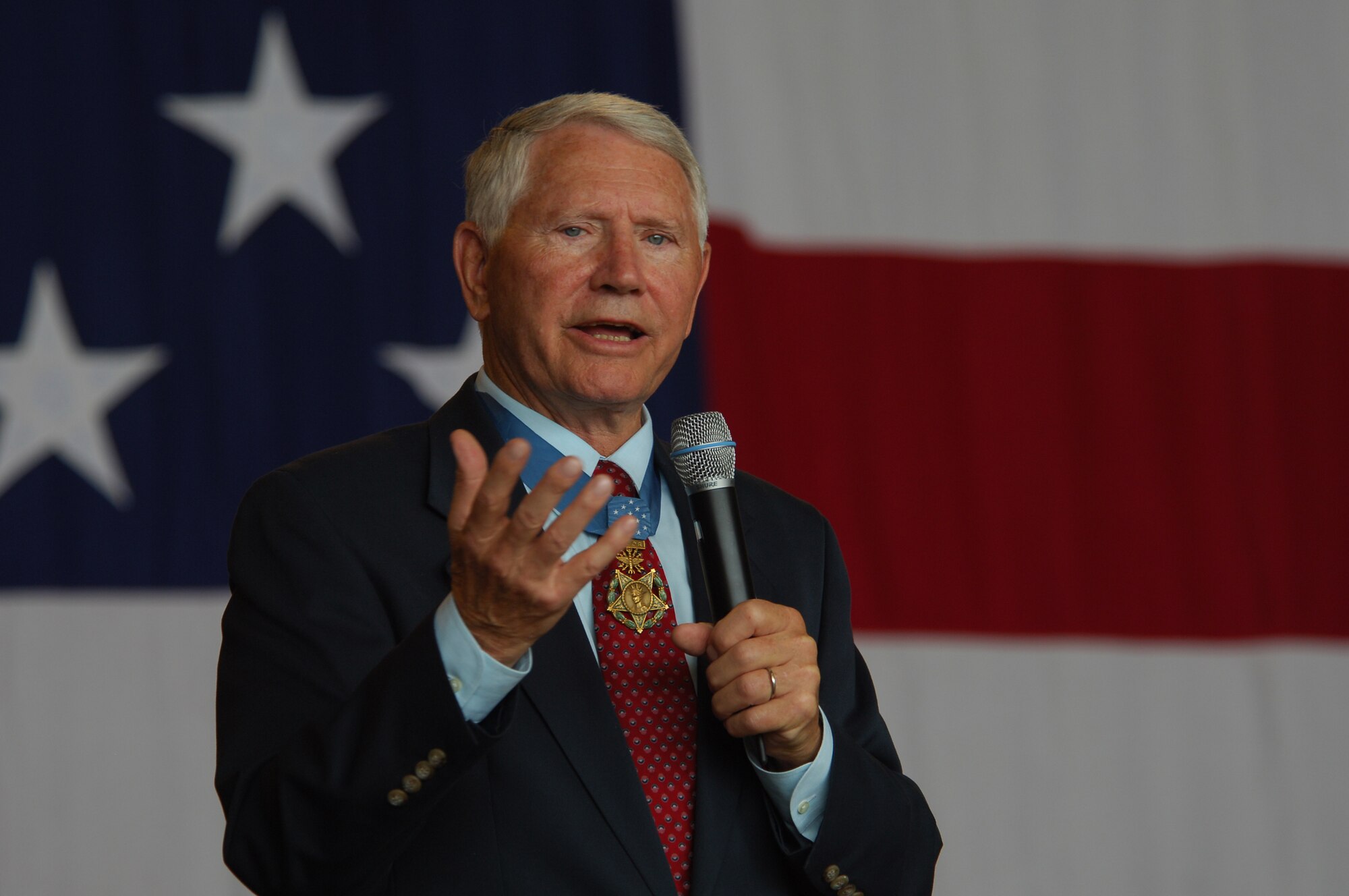 Lt. Col (Ret) Leo Thorsness addresses the crowd enjoying U.S. Air Forces in Europe's Air Force 60th Anniversary celebration, August 11, 2007, Ramstein Air Base, Germany. Col Thorsness, a Medal of Honor recipient, was one of the highlights of the celebration. (U.S. Air Force photo/Airman 1st Class Kenny Holston)(RELEASED)     