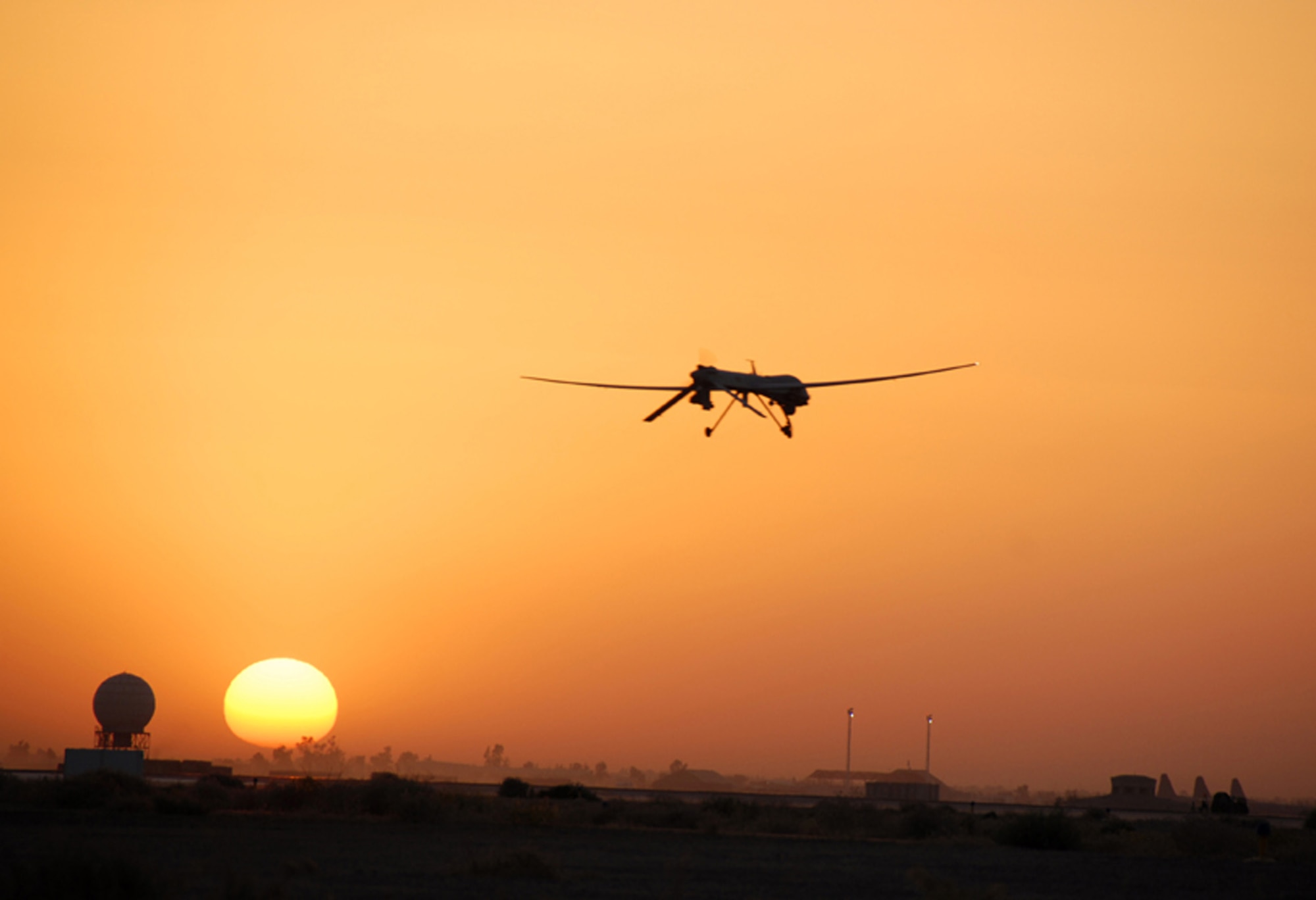 An Air Force MQ-1B Predator unmanned aerial vehicle goes out on patrol from Balad Air Base, Iraq. Predators fly intelligence, surveillance and reconnaissance missions for operations Enduring Freedom and Iraqi Freedom. Eight MQ-1s flew missions in the area of responsibility Aug. 10. (U.S. Air Force photo)  
