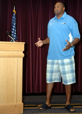WHITEMAN AIR FORCE BASE, Mo. - Neil Smith talks to members of Team Whiteman about football at Mission’s End Aug. 8. Neil Smith finished his 13-year  National Football League career with 105 sacks, 12 fumble recoveries, 19 return yards, and 1 touchdown. (U.S. Air Force Photo/Airman 1st Class Stephen Linch)