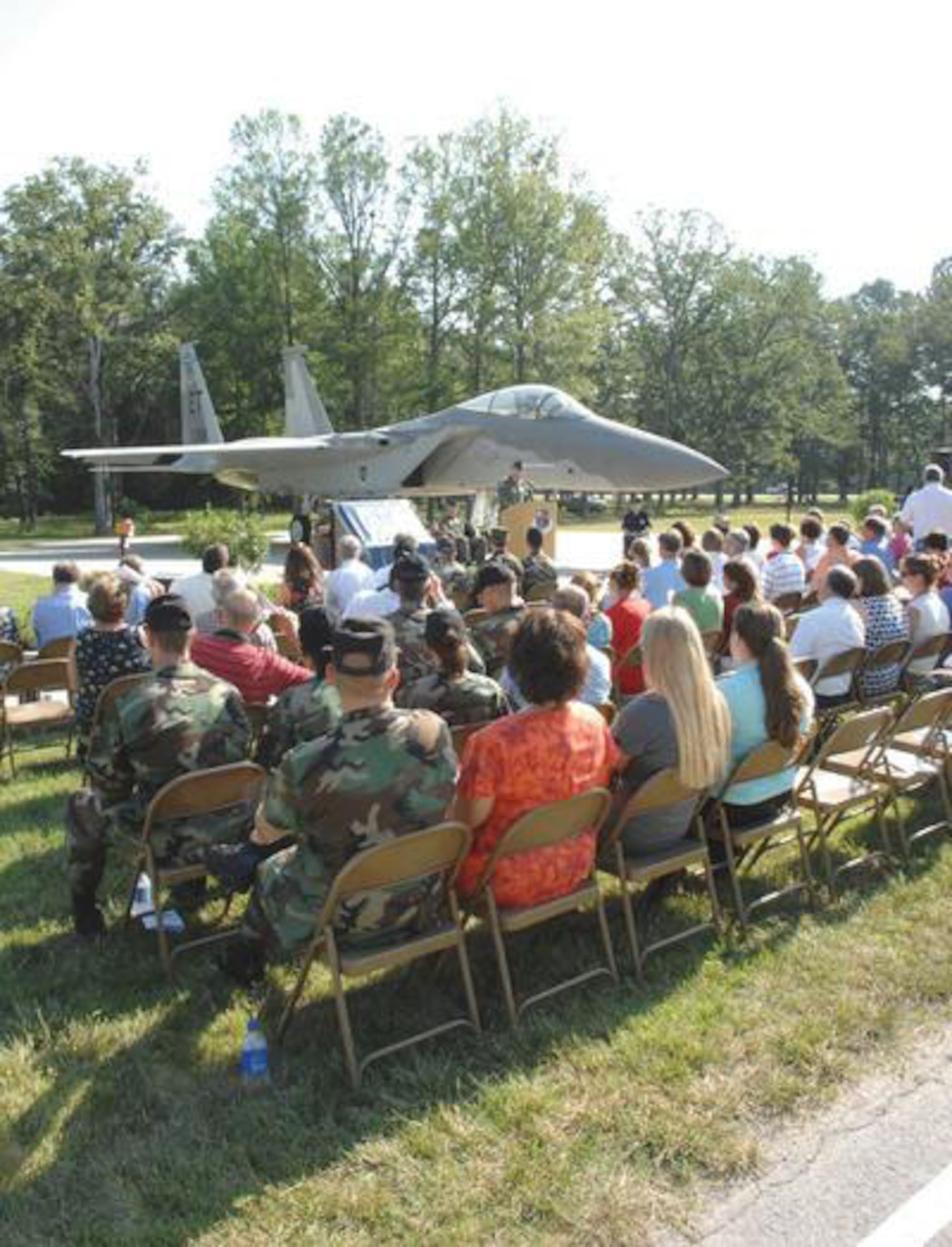Brig. Gen. C. D. Moore II, commander of the 478th Aeronautical Systems Wing at Wright-Patterson AFB, pays tribute to Major Jim Duricy at AEDC's F-15 Eagle dedication ceremony. 