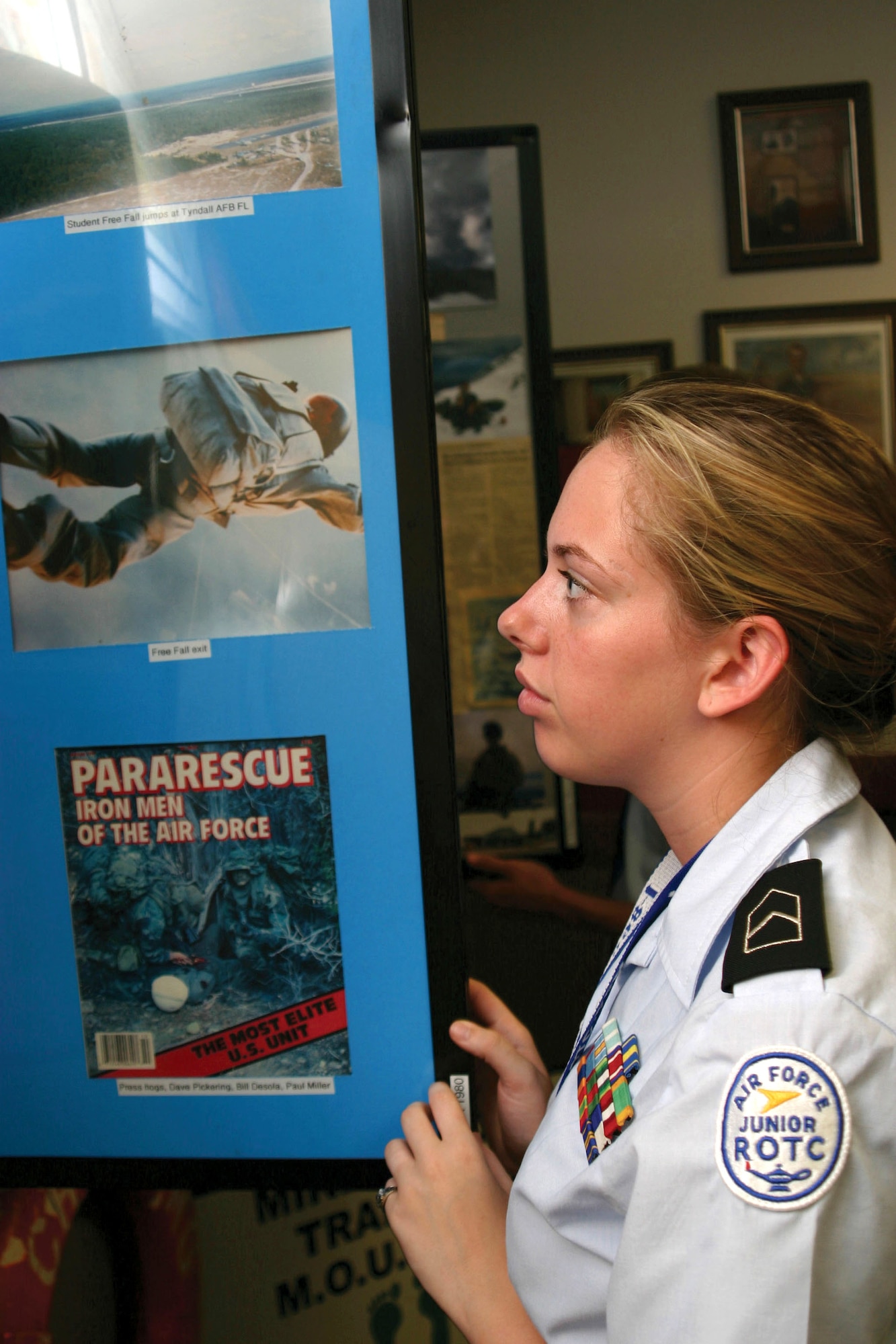 Air Force Junior ROTC Cadet Stephanie Hurstell looks through a display July 26 during a visit to the Pararescue and Combat Rescue Officer Training School at Kirtland Air Force Base, N.M.  Air Force officials continually seek retired Airmen, including Guard and Reserve, from any Air Force specialty who are interested in becoming an AFJROTC instructor.  (U.S. Air Force photo/Staff Sgt. Jason Lake)