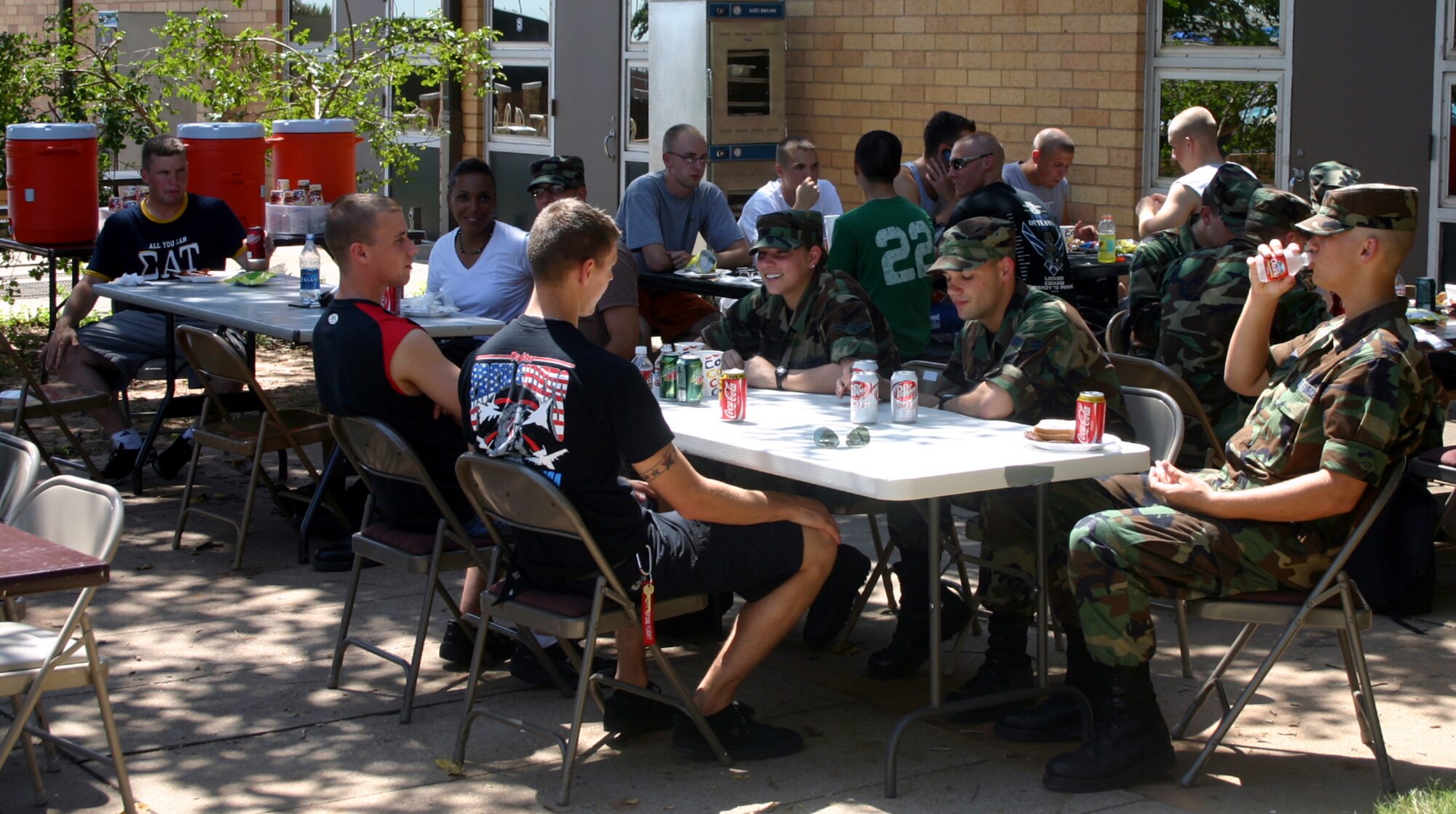Airmen-in-Training enjoy time away from the classrooms and dormitories at the Airman Appreciation Cookout at the Community Activity Center Aug. 11. (U.S. Air Force photo/Staff Sgt. Tonnette Thompson)