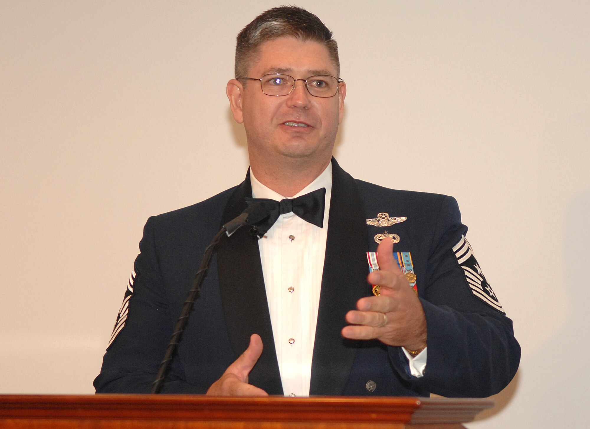 Air Force Space Command Chief Master Sgt. Michael Sullivan was the keynote speaker at the second annual Senior NCO Induction Ceremony held in the Gordon Conference Center, Aug. 3. Approximately 20 master sergeant selectees joined the senior NCO ranks  at the dinner. SMC’s  percentage of technical sergeants selected for promotion to master sergeant surpassed both Air Force Space Command and the Air Force. (Photo by Stephen Schester)
