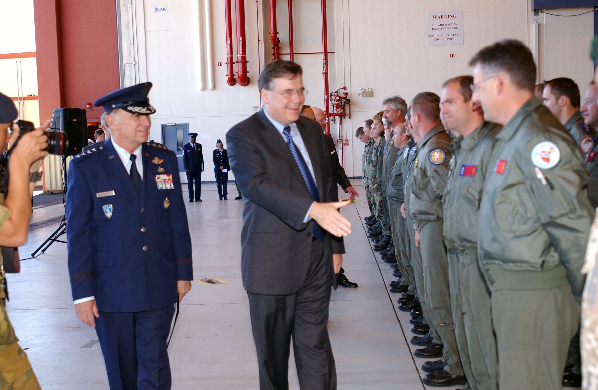 Gen. William T. Hobbins and Iceland Prime Minister Geir H. Haarde greet Airmen and NATO forces Aug. 13 during the opening ceremonies of exercise Northern Viking 2007. The exercise is designed to demonstrate U.S. commitment to the 1951 bilateral U.S.-Iceland defense agreement and reinvigorate air defense command and control capabilities of joint and coalition forces in Iceland. General Hobbins is commander of U.S. Air Forces in Europe. (U.S. Air Force photo) 