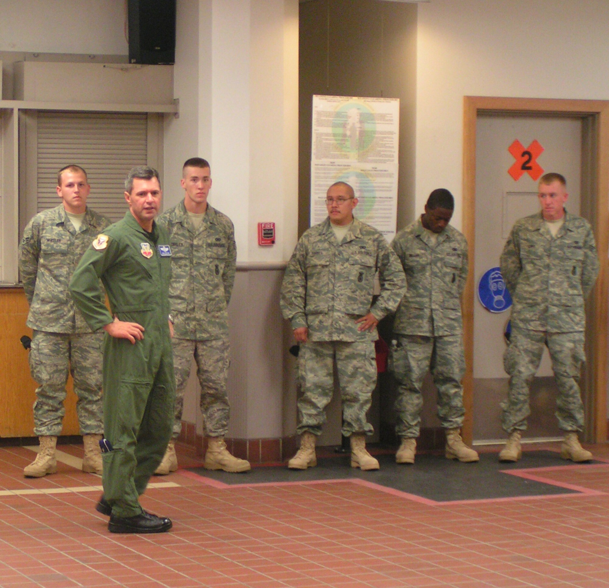 WHITEMAN AFB, Mo. - Brig. Gen. Greg Biscone, 509th Bomb Wing commander, delivers an inspirational speech to Airmen and family members from the 509th Security Forces Squadron before the troops head out on a 365-day deployment plus two-month pre-deployment training Aug. 14. "This message was spot-on for what the 16 troops and Airmen will be facing," said Chief Master Sgt. Robert Rush, 509th SFS. "They will be part of a 180-person team training the Iraqi police in downtown Baghdad. These young Airmen are primed and ready to go - we are so proud of them." (Photo printed with permission of Chief Master Sgt. Robert Rush)