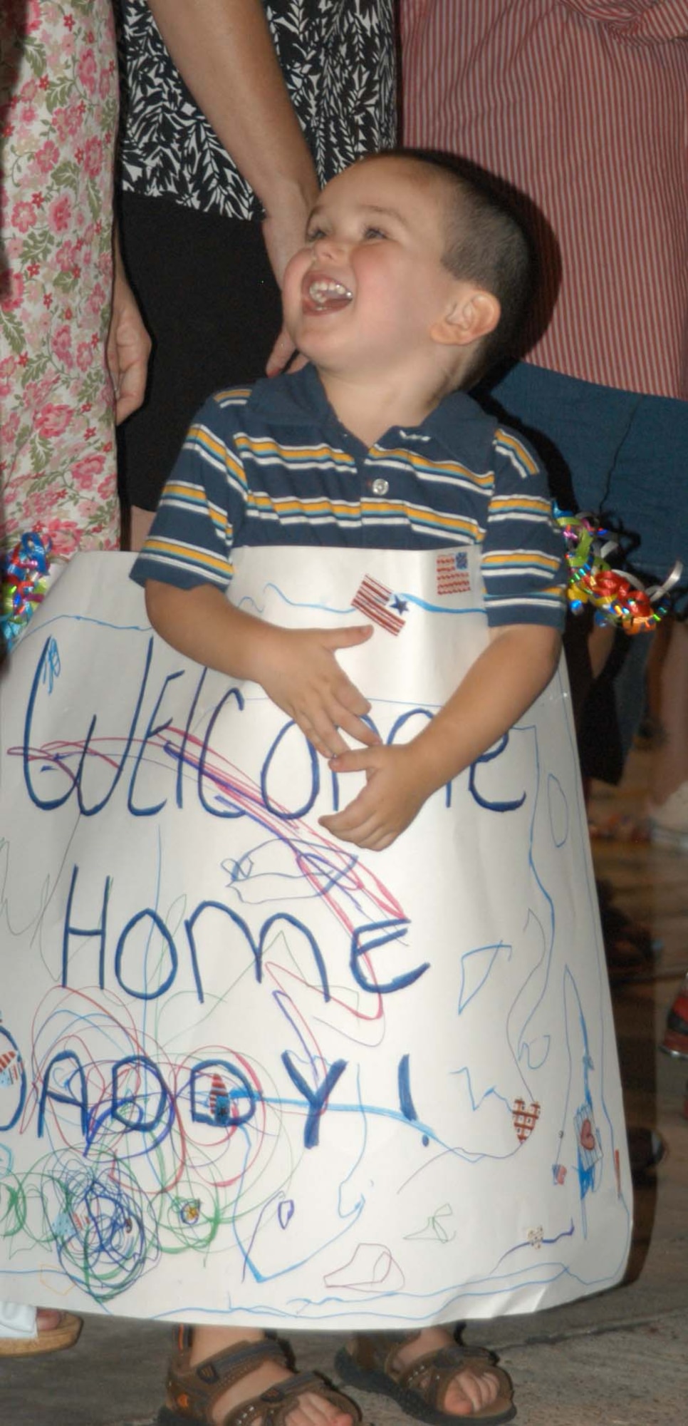 The 2 a.m. arrival time of his father, a reservist with the 301st Fighter Wing, Naval Air Station Joint Reserve Base Fort Worth, Texas, returning from a 90-day Aerospace Expeditionary Force deployment in Iraq did not curtail the excitement in this little boy, nor any of the family members awaiting the return of the other 100 reservists. (U.S. Air Force Photo/Laura Dermarderosian-Smith)