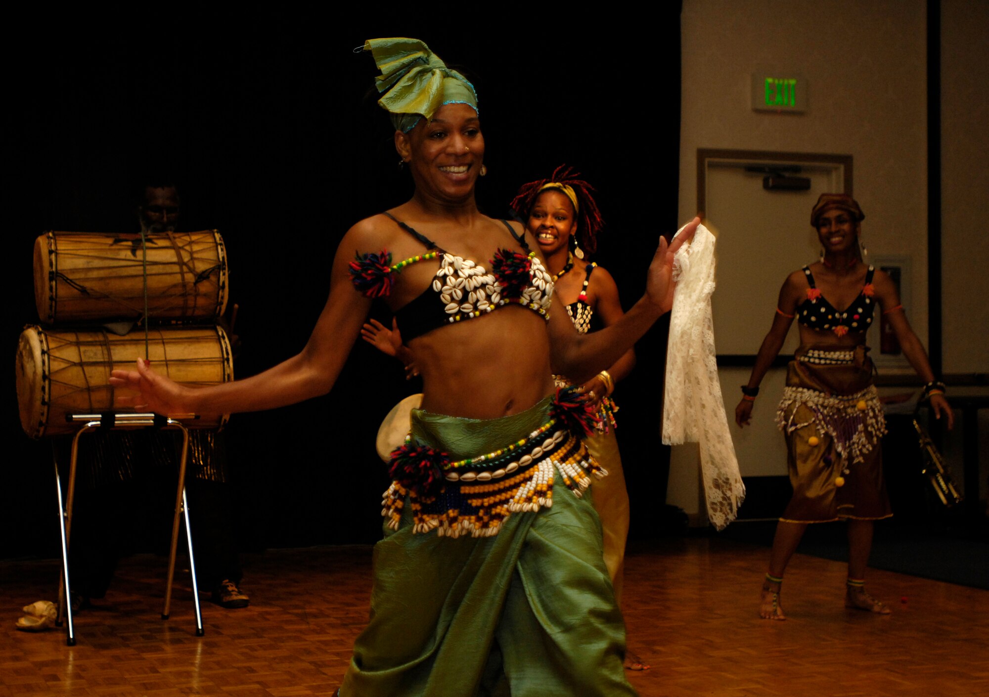 VANDENBERG AIR FORCE BASE, Calif. -- A member of an African dance ensemble from Los Angeles dances to the beat of a live band during the Cultural Heritage Day here on Aug.10. Vandenberg's Cultural Heritage Day combined all annual cultural observances into one gala event of food, music, dance and displays. (U.S. Air Force photo/Airman 1st Class Christian Thomas)
