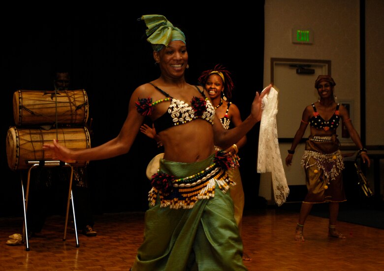 VANDENBERG AIR FORCE BASE, Calif. -- A member of an African dance ensemble from Los Angeles dances to the beat of a live band during the Cultural Heritage Day here on Aug.10. Vandenberg's Cultural Heritage Day combined all annual cultural observances into one gala event of food, music, dance and displays. (U.S. Air Force photo/Airman 1st Class Christian Thomas)
