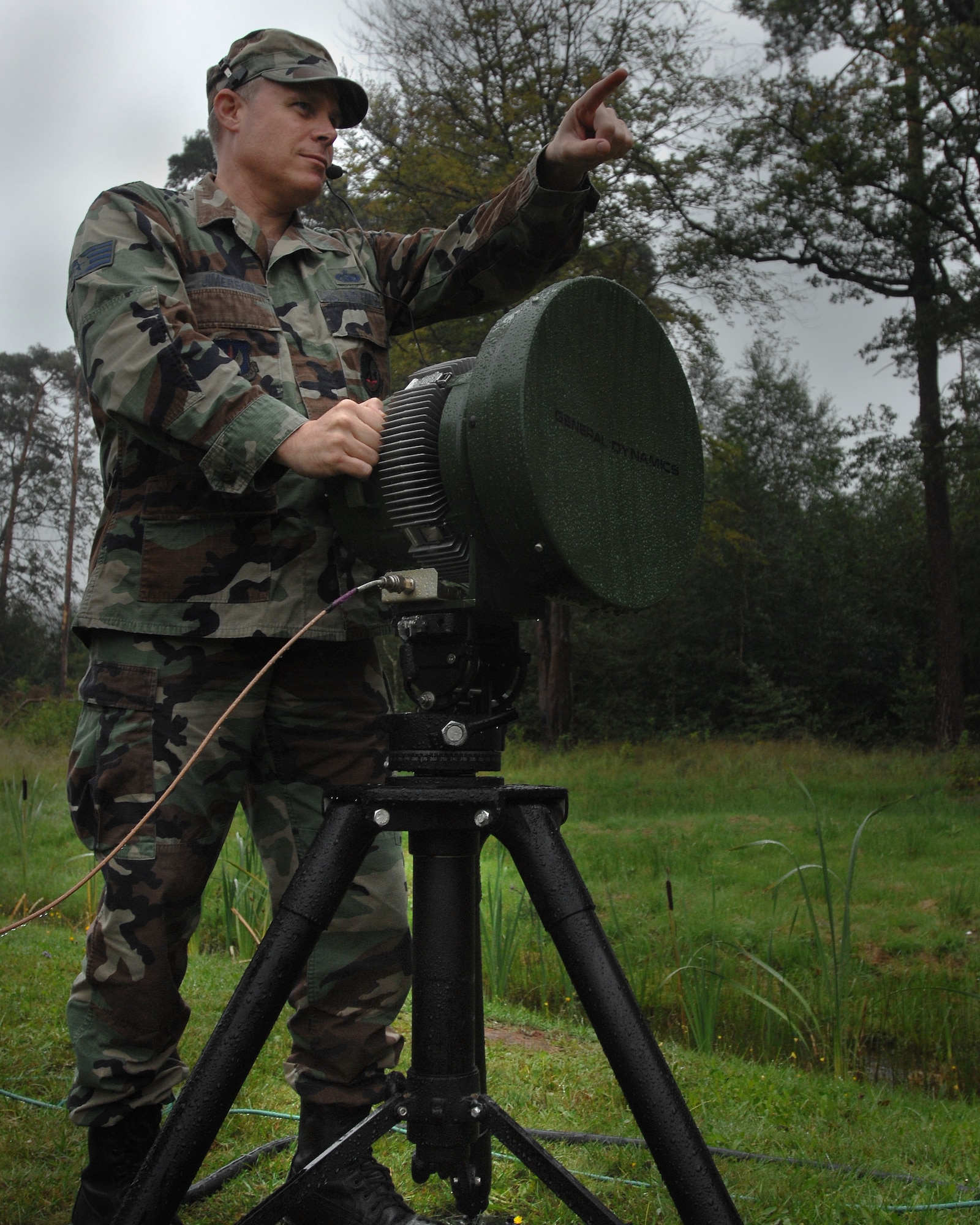 1st Combat Communications Squadron tech control technician Staff Sgt. Les Jimerson provides direction to his Airmen to extend wireless voice and data services to the command operations tent on Camp Fasnacht during exercise Healthy Star Aug. 9, 2007 Ramstein Air Base, Germany. Healthy Star is a field training exercise to prepare combat communications Airmen for deployed situations.  (U.S. Air Force photo/Airman 1st Class Kenny Holston)