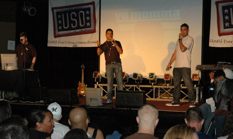 OSAN AIR BASE, Republic of Korea -- Wilmer Valderrama, host of MTV's "Yo' Mama," addresses servicemembers at the Challenger Club here Aug. 10. Valderrama and R&B singer Franie J. performed for and interacted with servicemembers here as part of a USO tour. (U.S. Air Force photo by Staff Sgt. Benjamin Rojek)
