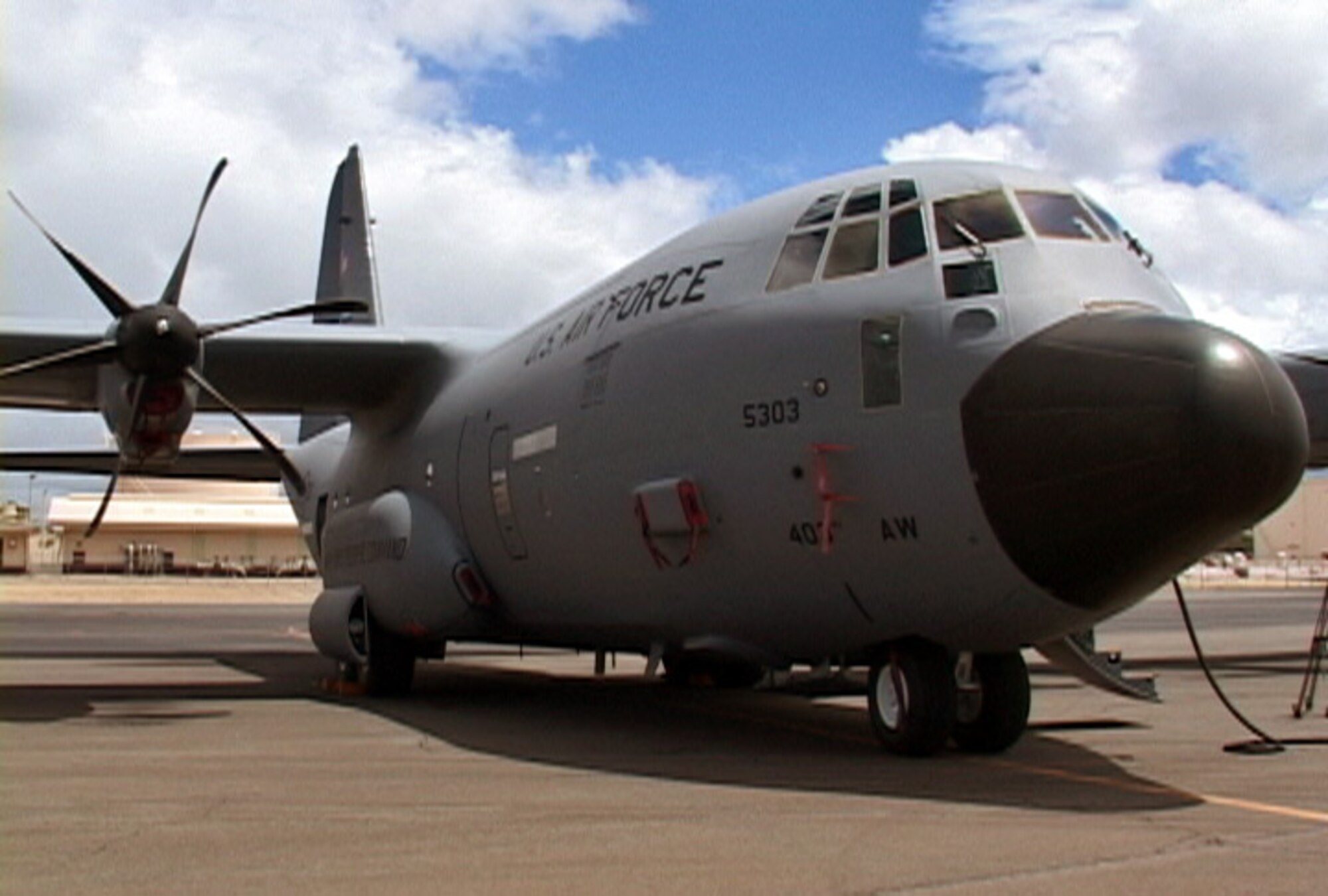 A C-130 Hurricane Hunter aircraft sits on the flightline at Hickam Air Force Base on 13 August, 2007. The Air Force Reserve Command sent four of the specially equipped C-130s to Hickam to fly into Hurricane Flossie. (US Air Force photo/Tech. Sgt. Chris Vadnais)