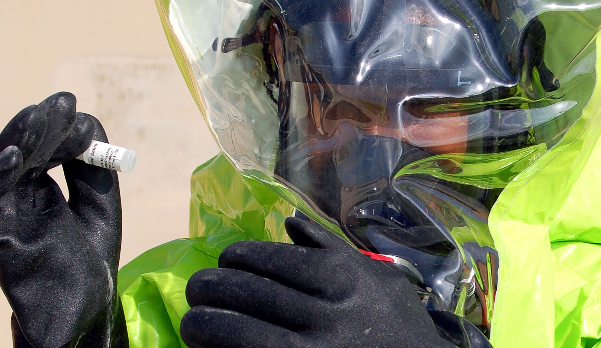A student attending the Expeditionary Medical Support course at Brooks City-Base, Texas, conducts a chemical test Aug. 8 during the exercise portion of the class. The class is held 20 times a year and contains anywhere from 50 to 70 students. (U.S. Air Force Photo/Staff Sgt. Jeremy Larlee) 