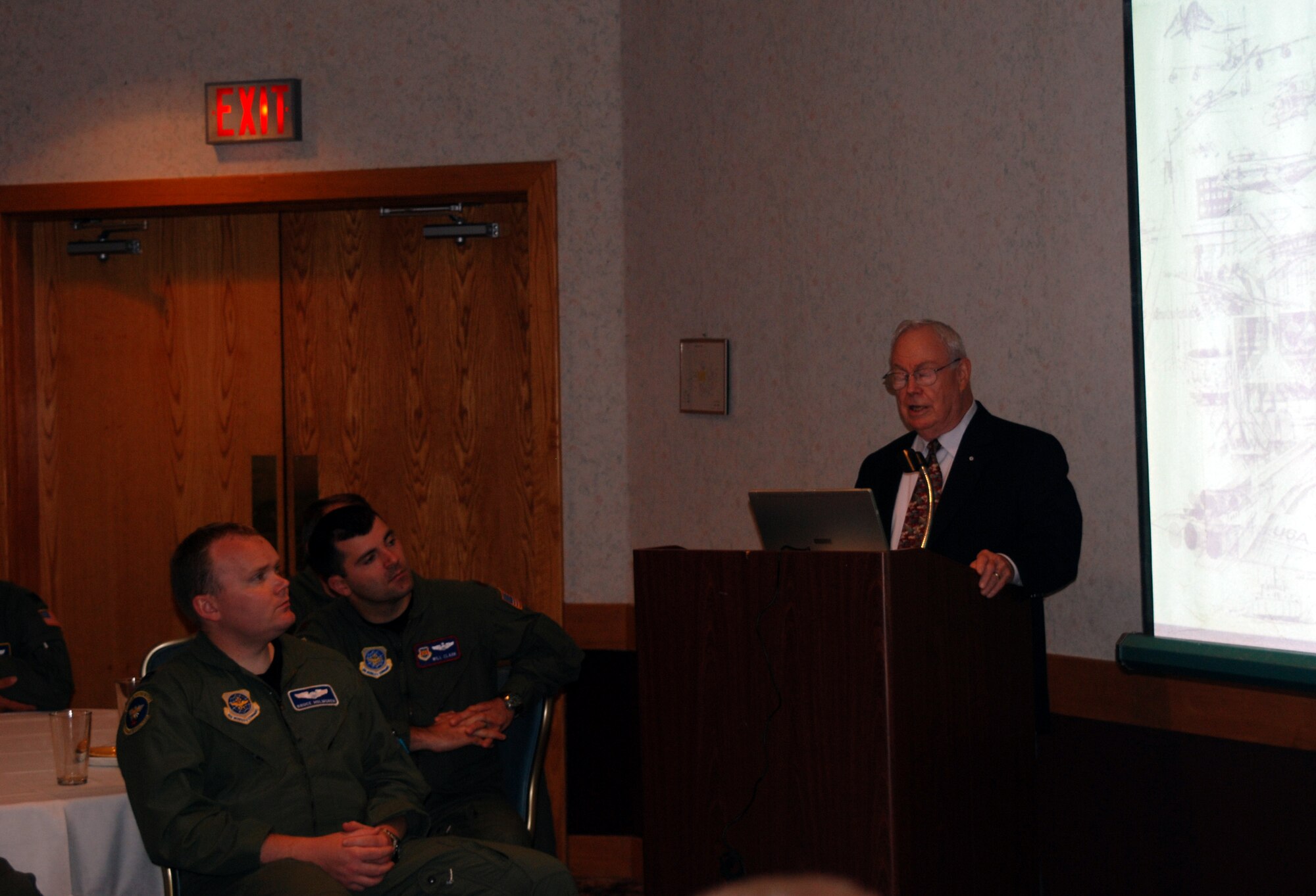 Keith Ferris, dean of the Air Force Artist Association, speaks at the Airlift Tanker Association meeting at The Club Aug. 15. Mr. Ferris has been a member of the Air Force Artist Association for 46 years. He has donated 59 of his paintings to the program and is currently working on his sixtieth piece to donate to the Air Force this year, to correspond with the Air Force’s sixtieth anniversary. 
