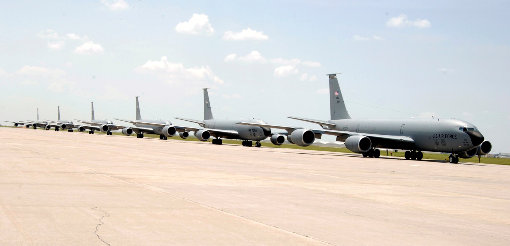 Six KC-135 Stratotankers demonstrate the elephant walk formation as they taxi down a runway right behind each other during a generation exercise Aug. 5 at McConnell Air Force Base, Kan. The exercise showcased McConnell AFB aircrews' capability to prepare a flight and take off within minutes of being notified of a mission. (U.S. Air Force photo/Airman Airman Justin Shelton)
