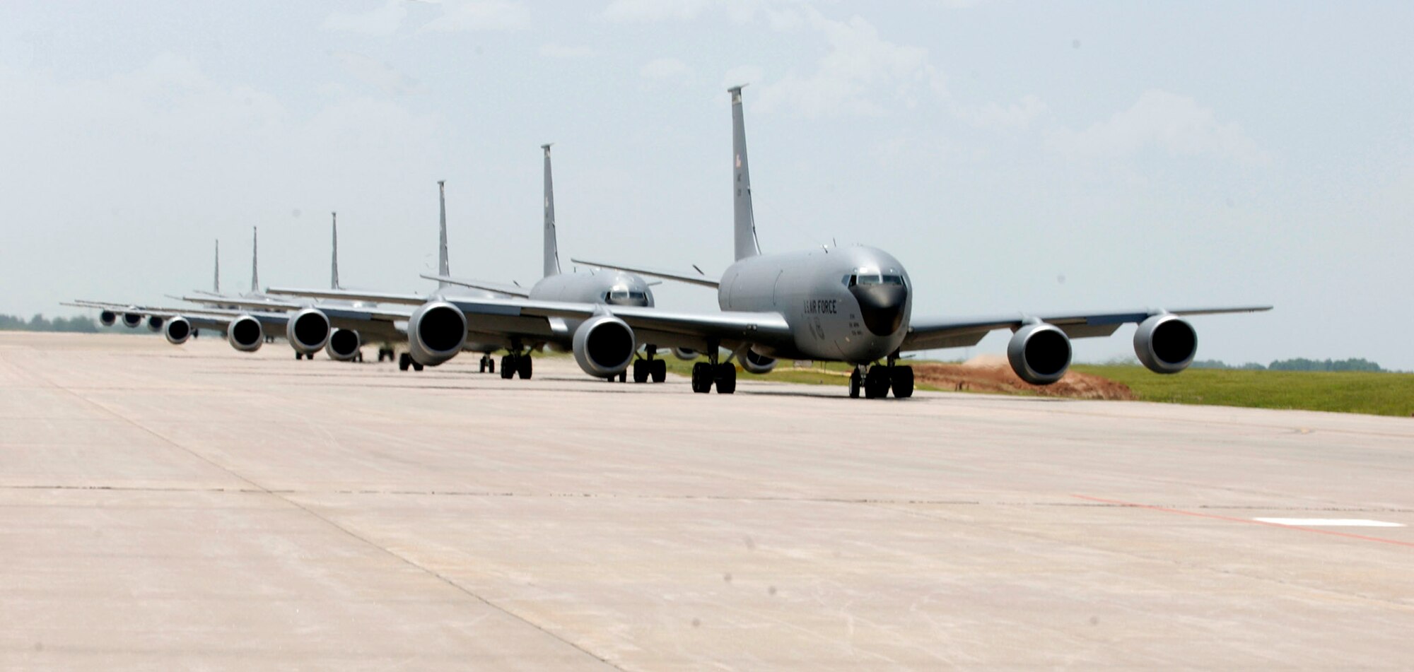 Six KC-135 Stratotankers demonstrate the elephant walk formation as they taxi down a runway right behind each other during a generation exercise Aug. 5 at McConnell Air Force Base, Kan. The exercise showcased McConnell AFB aircrews' capability to prepare a flight and take off within minutes of being notified of a mission. (U.S. Air Force photo/Airman Airman Justin Shelton)
