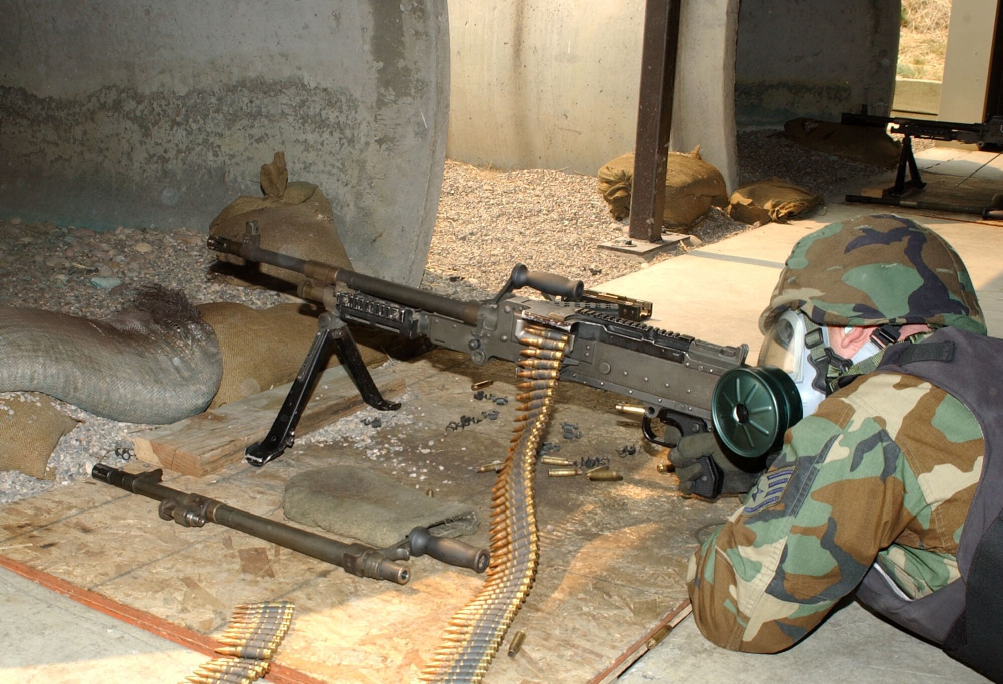 Staff Sgt. Clifford Kinsman 341st Missile Security Forces Squadron flight security controller qualifies on an M-240B machine gun during a weapons course at Malmstrom Air Force Base's Combat Arms Training and Maintenance facility Aug. 13, 2007.   (U.S. Air Force photo by Airman 1st Class Emerald Ralston)                            