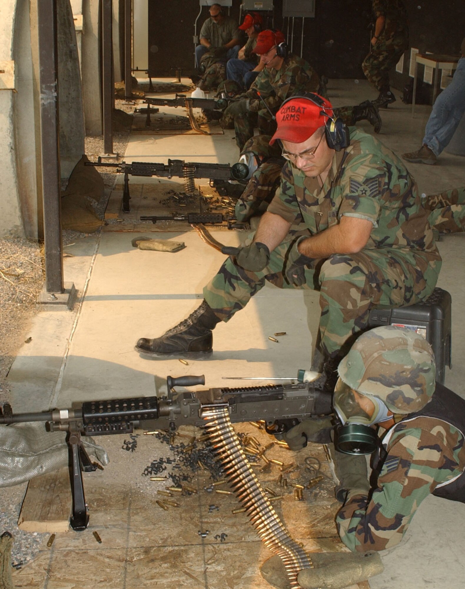 Senior Airman Christopher Basil, 341st Missile Security Forces Squadron, qualifies on the M-240B at Malmstrom Air Force Base's Combat Arms Training and Maintenance facility Aug. 13, 2007. (U.S. Air Force photo by Airman 1st Class Emerald Ralston)  