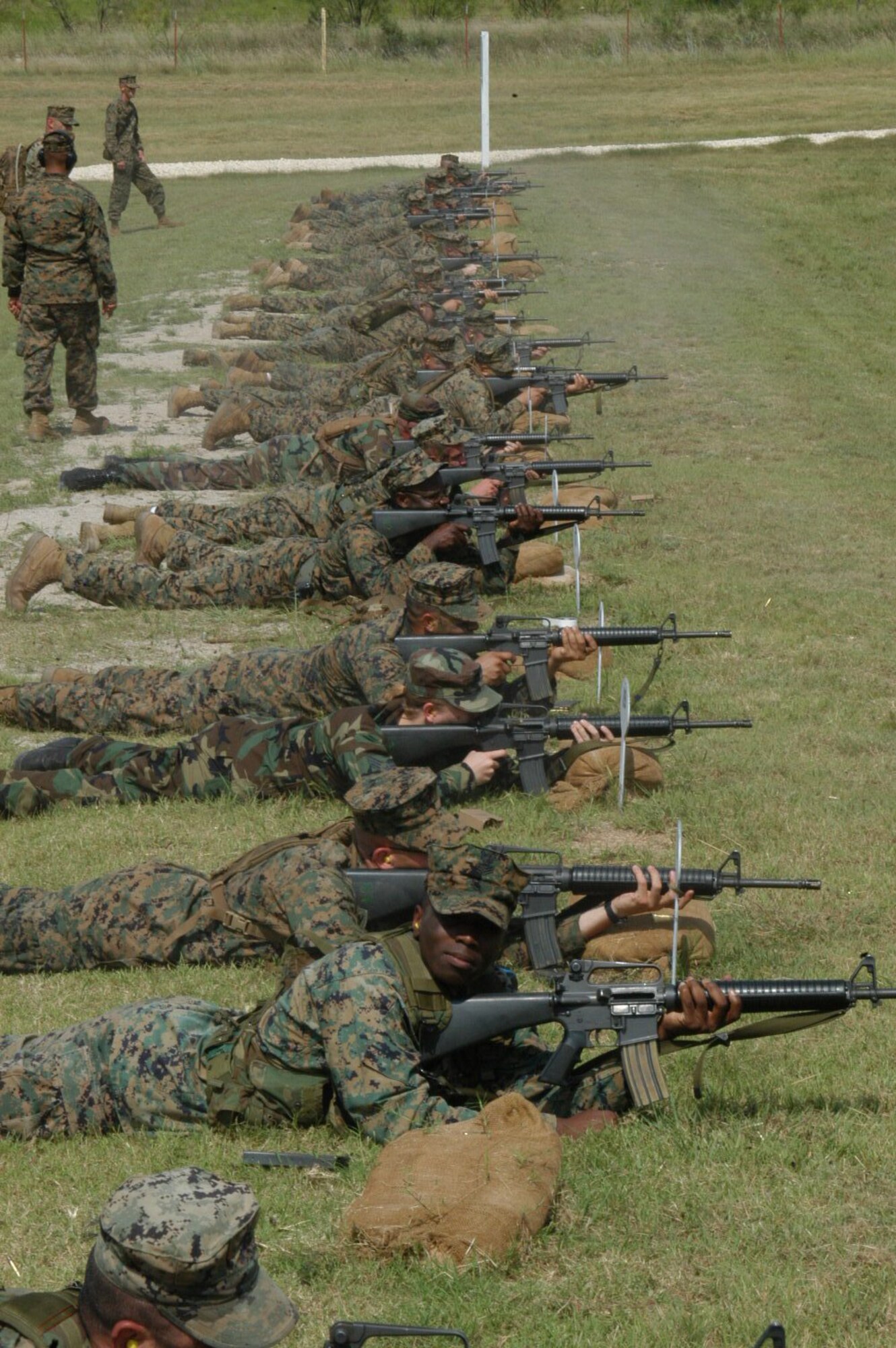 Marines and Airmen practice shooting the M16 on the firing range at Camp Bowie, Texas, Aug. 4. (U.S. Air Force photo by Senior Airman Carolyn Viss)