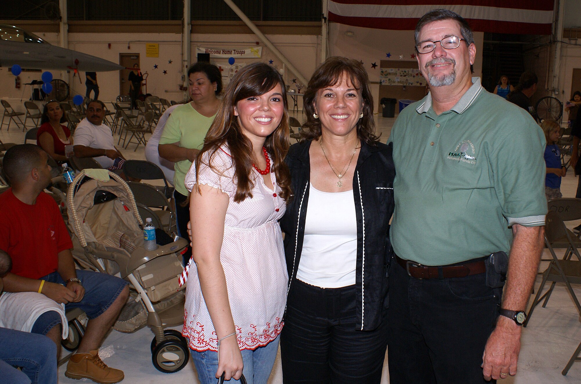 City of Homestead Councilwoman Lynda Bell and her family attended the homecoming reception for the reservists returning from a deployment to Balad Air Base, Iraq. The 93rd Fighter Squadron from the 482nd Fighter Wing at Homestead Air Reserve Base provided close air support and surveillance and reconnaissance missions in support of U.S. and Coalition ground forces throughout its deployment. (U.S. Air Force photo/Senior Airman Erik Hofmeyer)