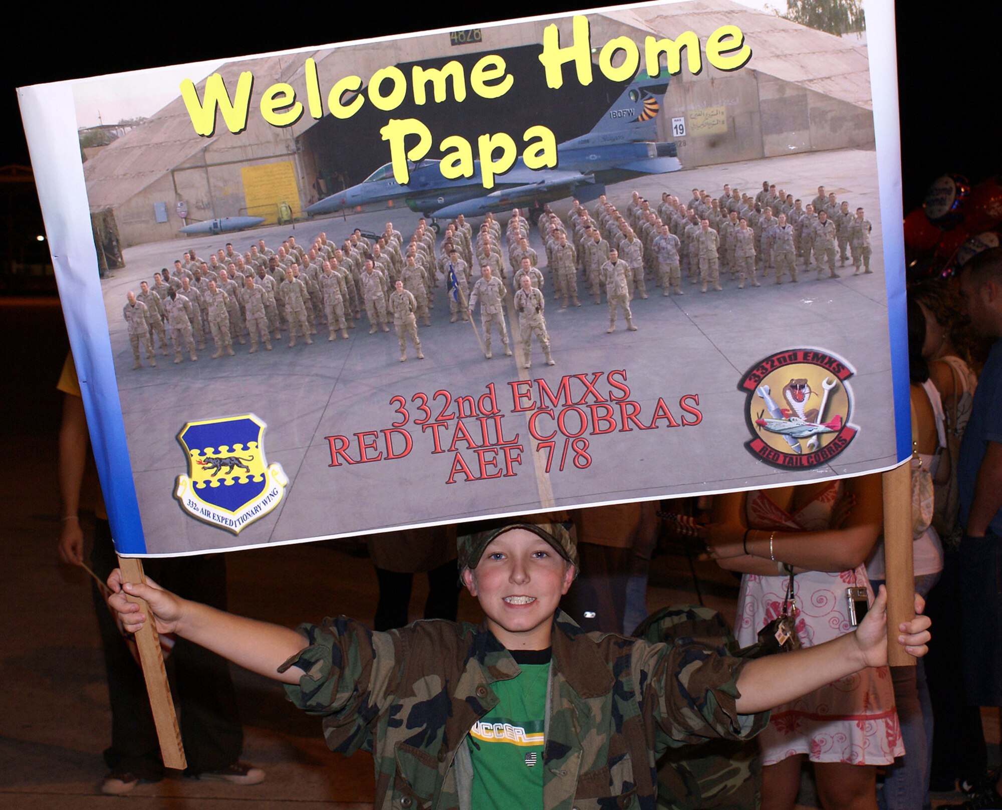 Family members, friends, and local media representatives eagerly awaited the arrival of more than 260 Airmen from the 482nd Fighter Wing from a deployment to Balad Air Base, Iraq. The 93rd Fighter Squadron from the 482nd Fighter Wing at Homestead Air Reserve Base provided close air support and surveillance and reconnaissance missions in support of U.S. and Coalition ground forces throughout its deployment. (U.S. Air Force photo/Senior Airman Erik Hofmeyer)