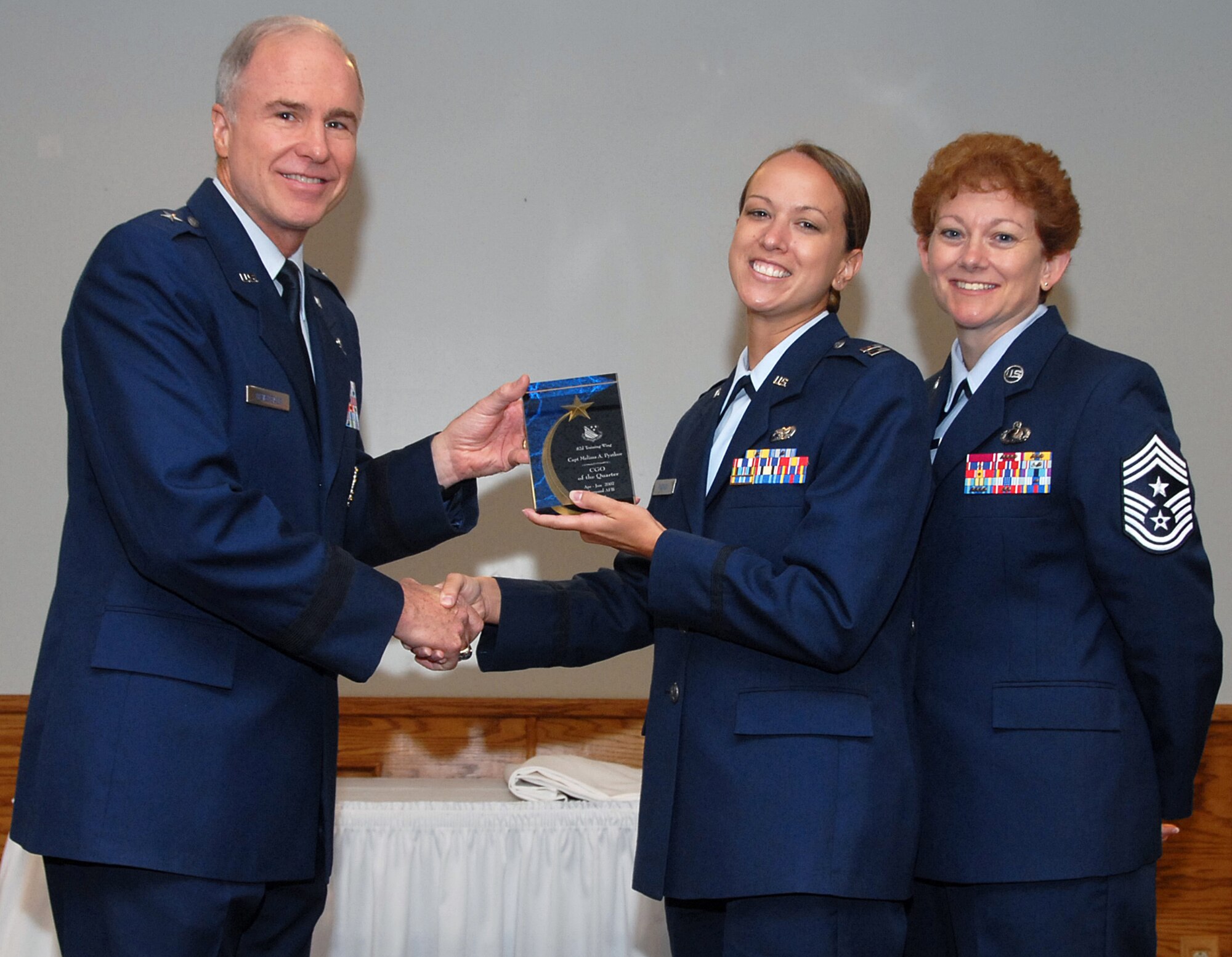 Capt. Melissa Pyatkov, 82nd Logistics Readiness Squadron, won in the company grade officer category. Seen here with 82nd Training Wing Commander Brig. Gen. Richard Devereaux and 82nd TRW Command Chief Chief Master Sgt. Jeannie McLean. (U.S. Air Force photo/Mike Litteken)