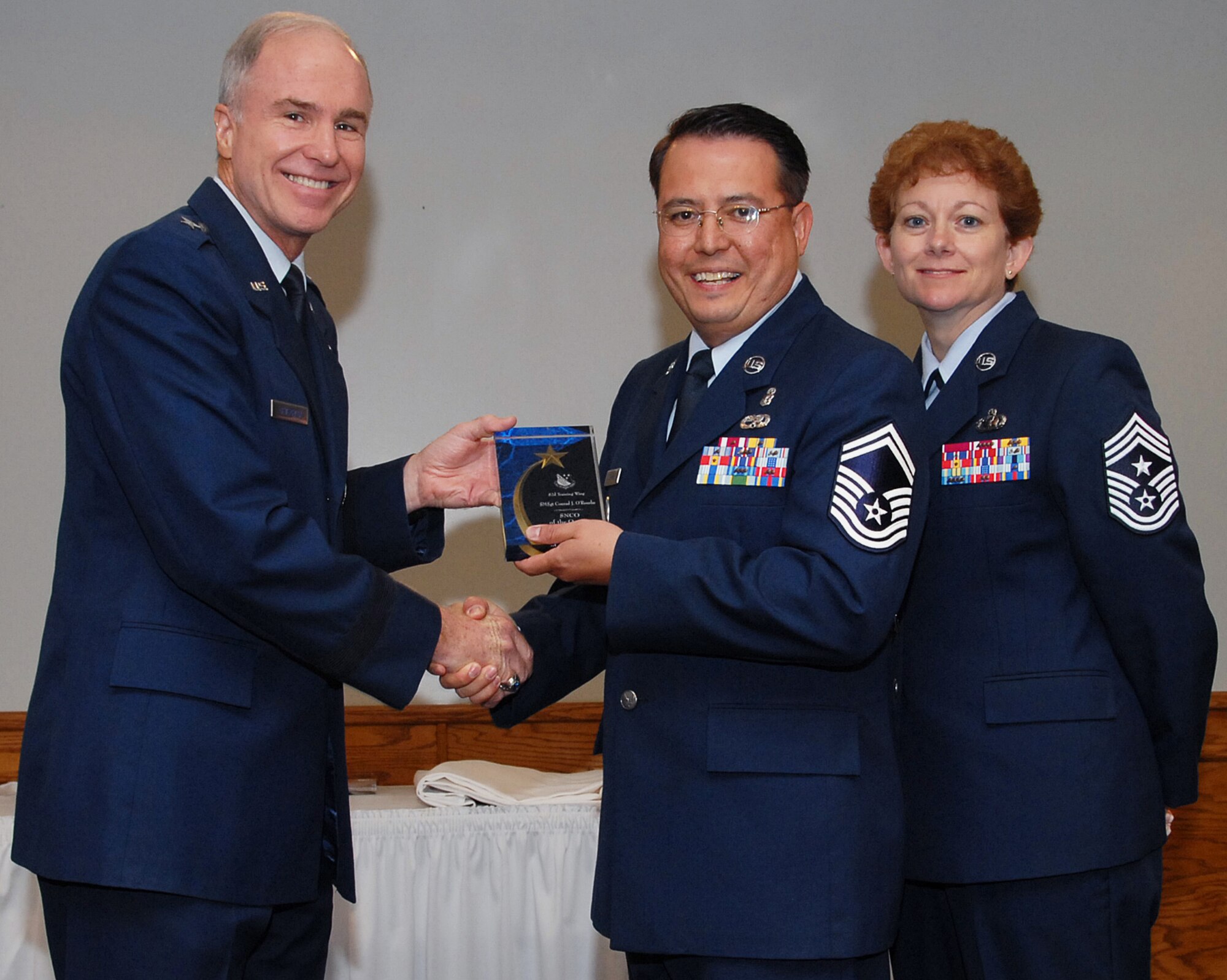Senior Master Sgt. Conrad O'Rourke, 982nd Training Squadron, won in the senior NCO category. Seen here with 82nd Training Wing Commander Brig. Gen. Richard Devereaux and 82nd TRW Command Chief Chief Master Sgt. Jeannie McLean. (U.S. Air Force photo/Mike Litteken)
