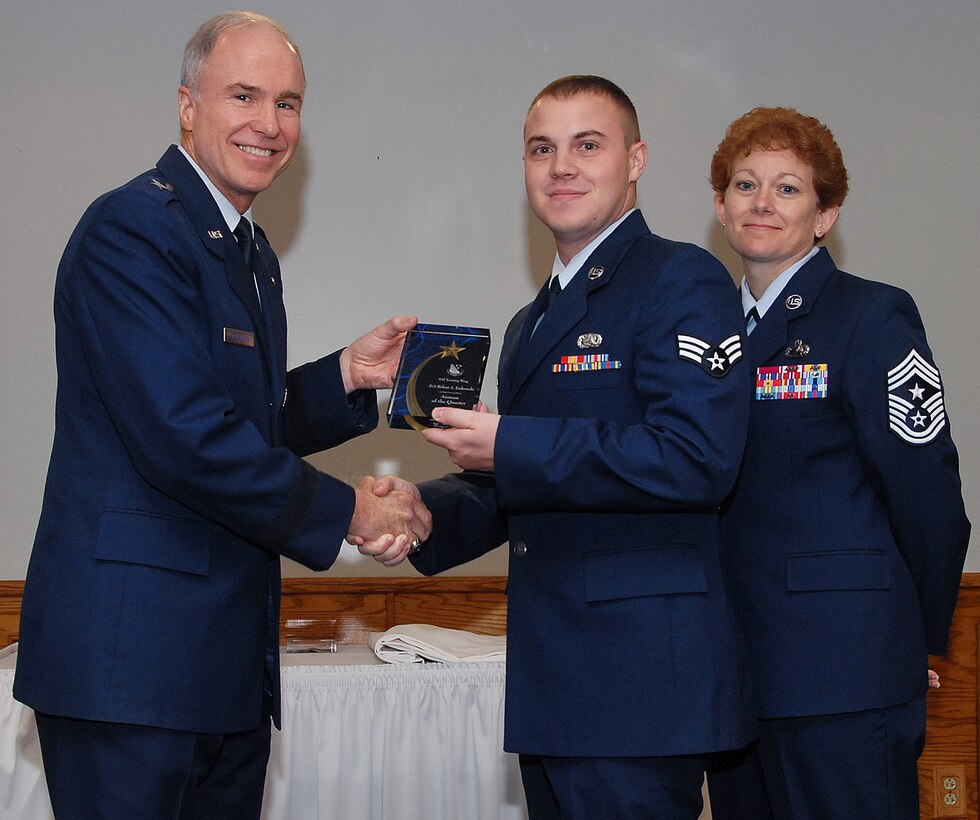 Senior Airman Robert Kedrowski, 982nd Maintenance Squadron, won in the Airman category. Seen here with 82nd Training Wing Commander Brig. Gen. Richard Devereaux and 82nd TRW Command Chief Chief Master Sgt. Jeannie McLean. (U.S. Air Force photo/Mike Litteken)