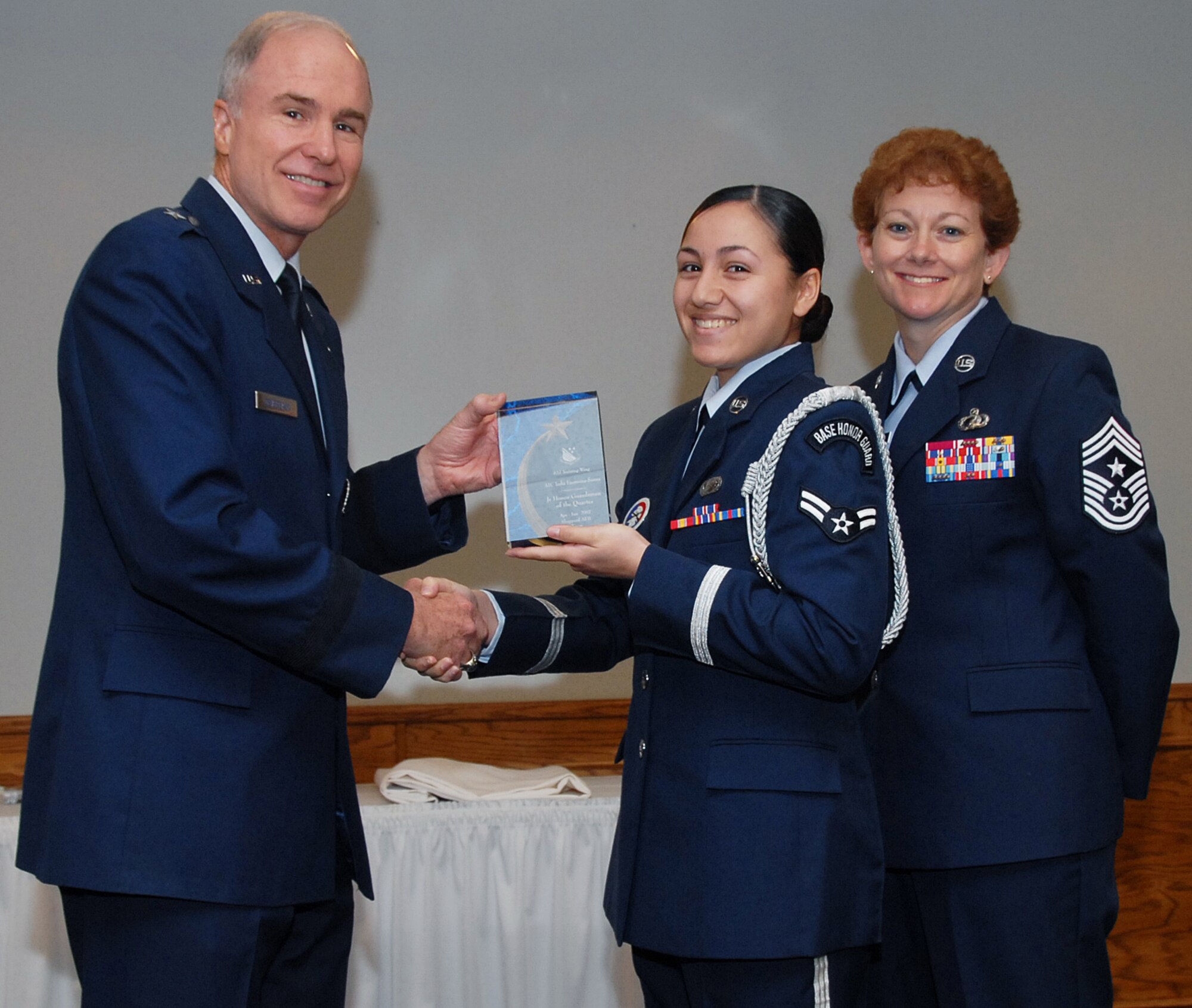 Airman 1st Class Tasha Faumuina-Soares, 82nd Mission Support Squadron, won in the junior Honor Guardsman category. Seen here with 82nd Training Wing Commander Brig. Gen. Richard Devereaux and 82nd TRW Command Chief Chief Master Sgt. Jeannie McLean. (U.S. Air Force photo/Mike Litteken)