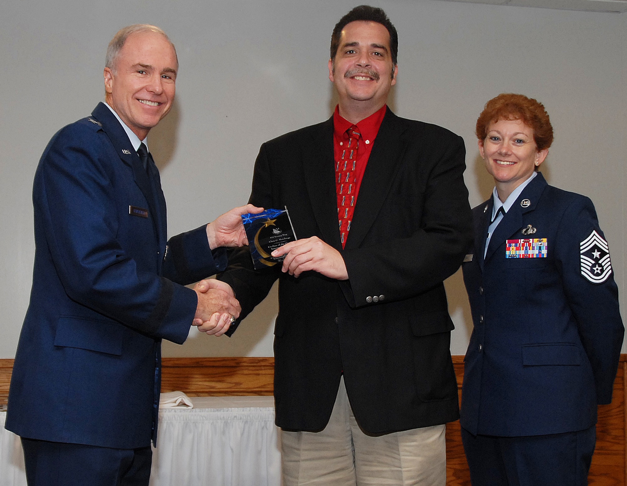 Chris Hutchings, 82nd Training Wing, won in the intermediate-level civilian category. Seen here with 82nd TRW Commander Brig. Gen. Richard Devereaux and 82nd TRW Command Chief Chief Master Sgt. Jeannie McLean. (U.S. Air Force photo/Mike Litteken)
