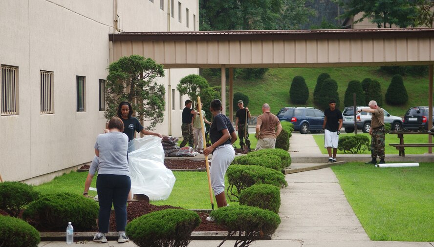 OSAN AIR BASE, Republic of Korea -- Members of the 51st Mission Support
Squadron clean up around their building on Aug. 15.  Personnel painted,
added new lava rocks and pulled weeds while the remaining members maintained
the workload inside.  Taking the time to clean up around each office or area
not only beautifies the squadron and base, but also raises morale.  (U.S.
Air Force Photo by Airman 1st Class Chad Strohmeyer)